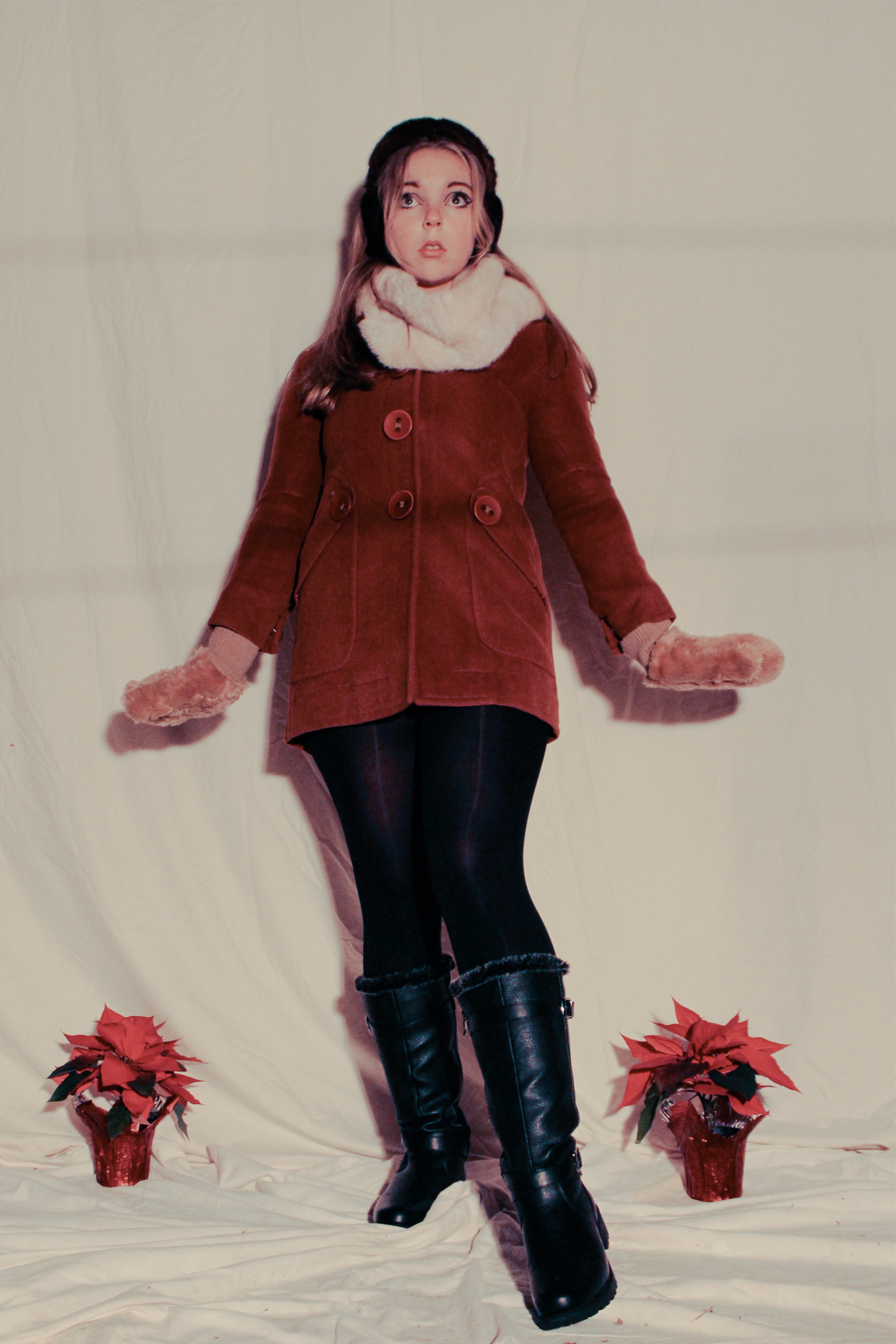 Woman from the 1960s in front of white backdrop