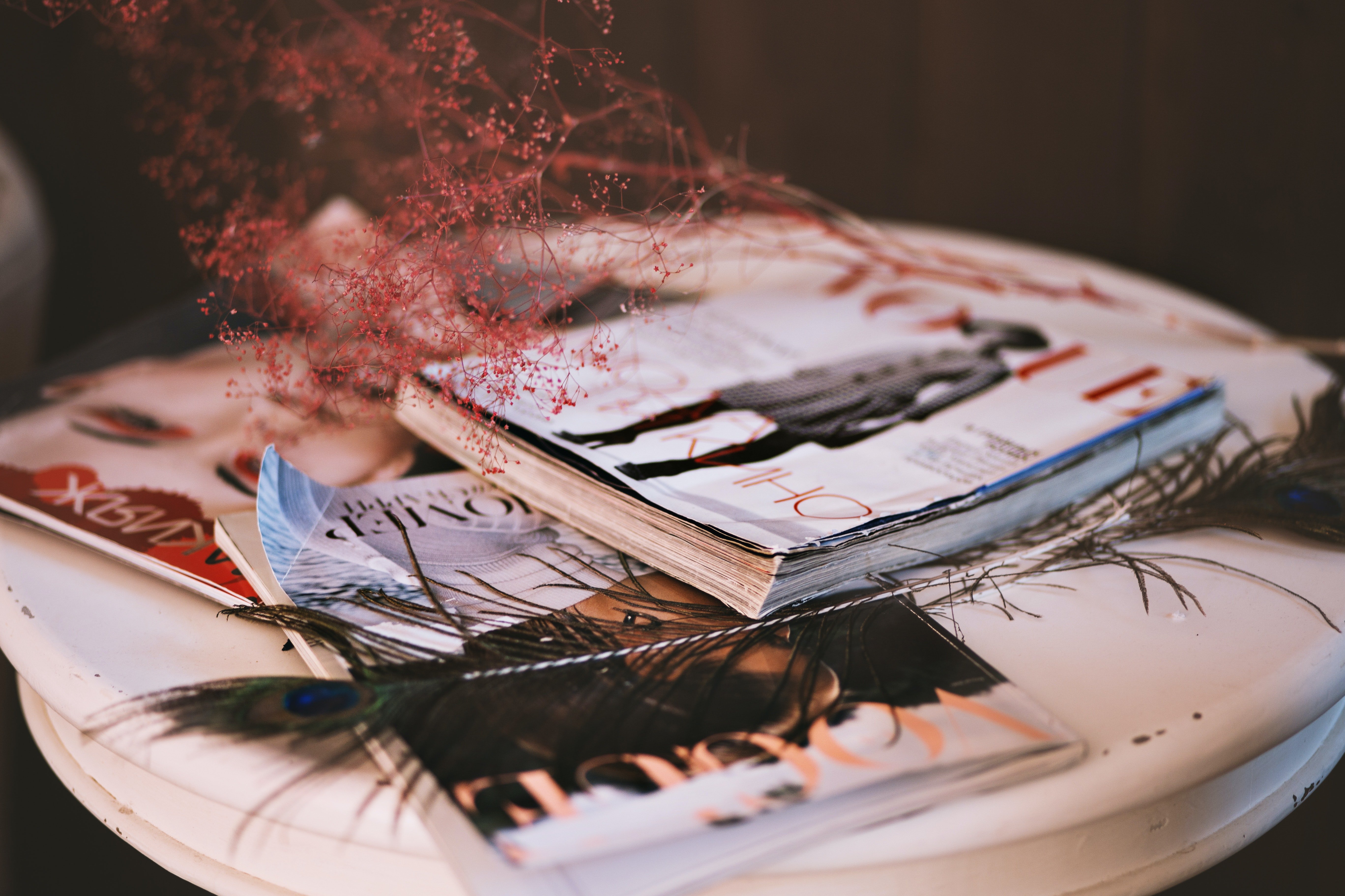 3 Magazines on Table