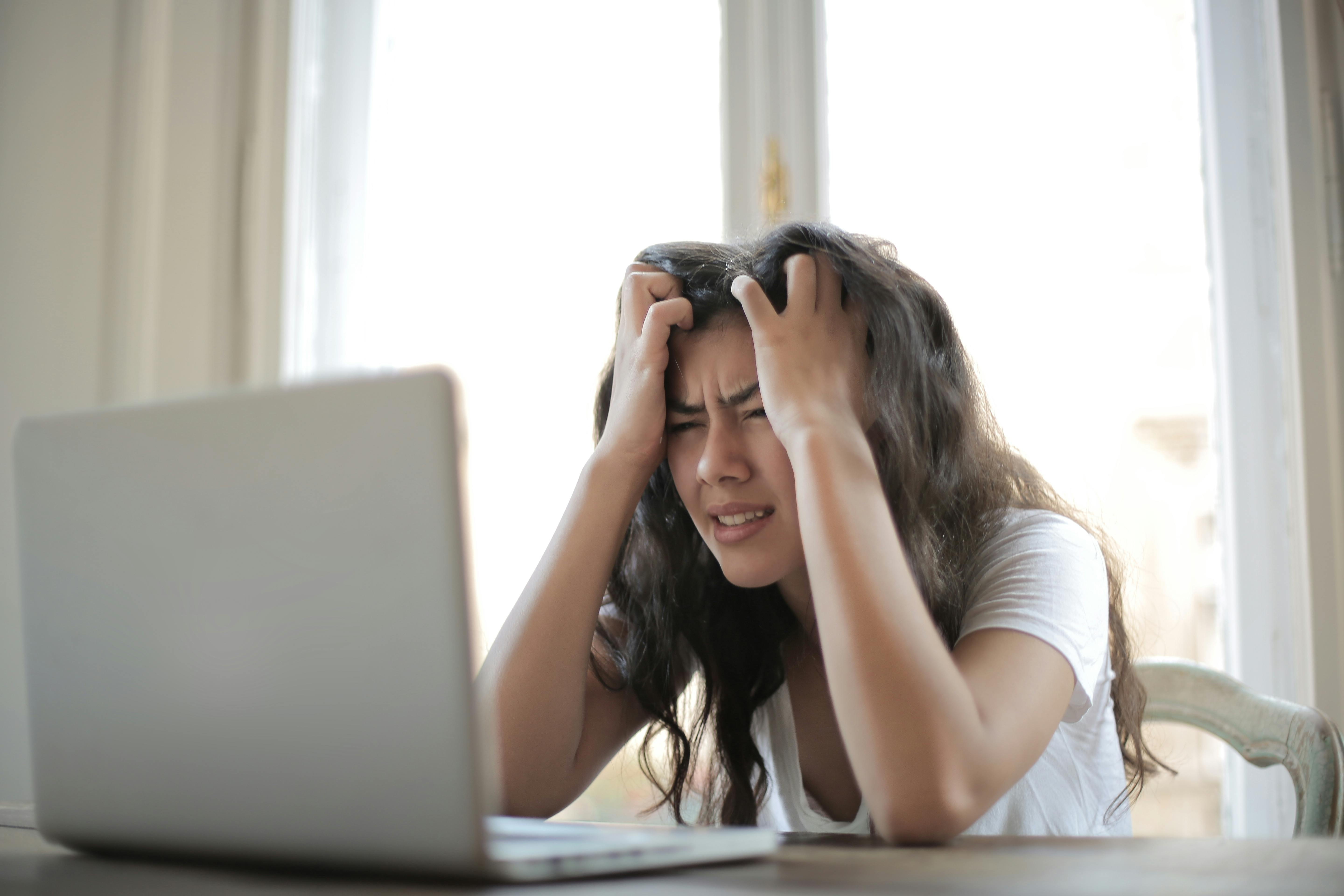 stressed girl and computer