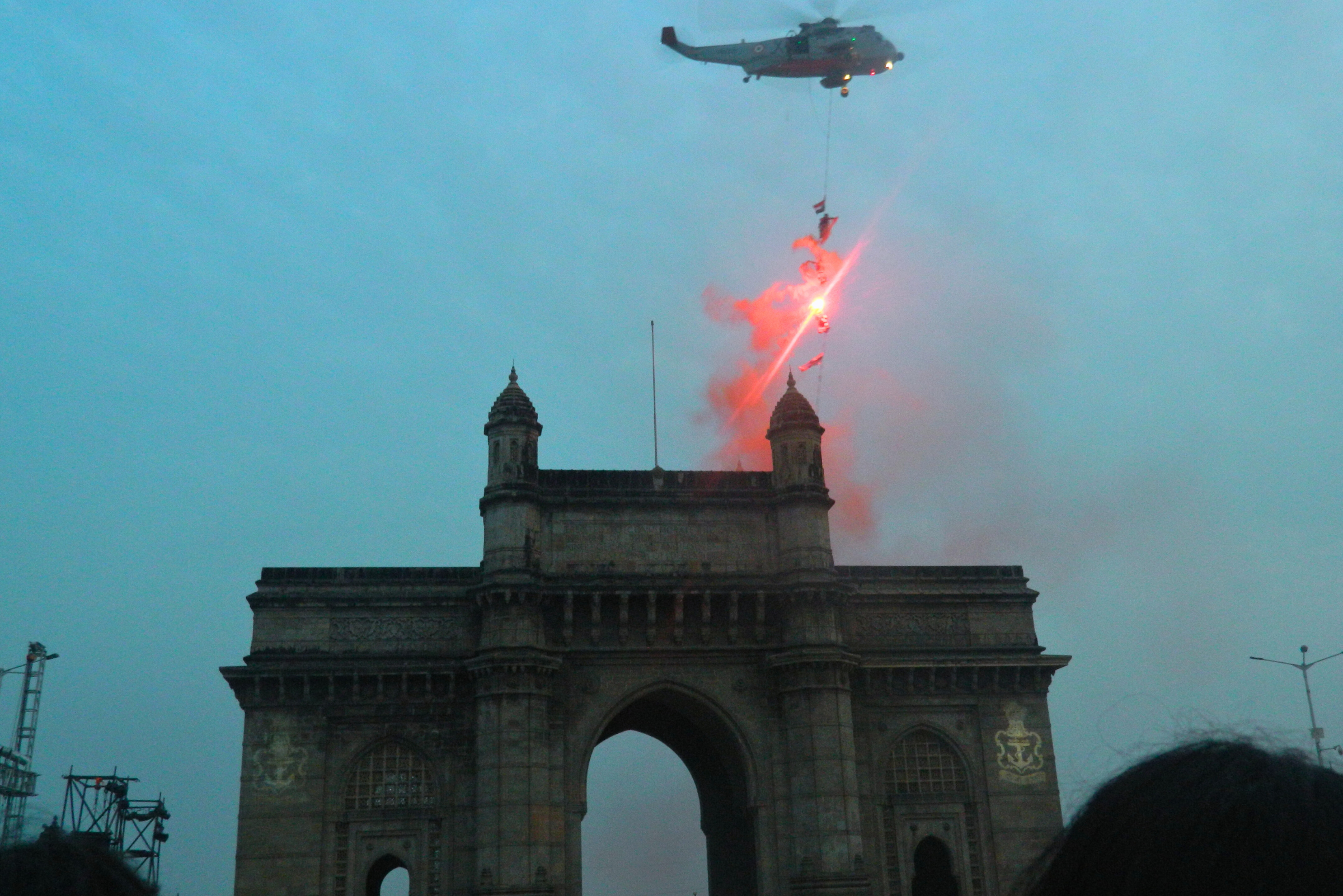 Helicopter over Gateway of India with Marine Commandos.
