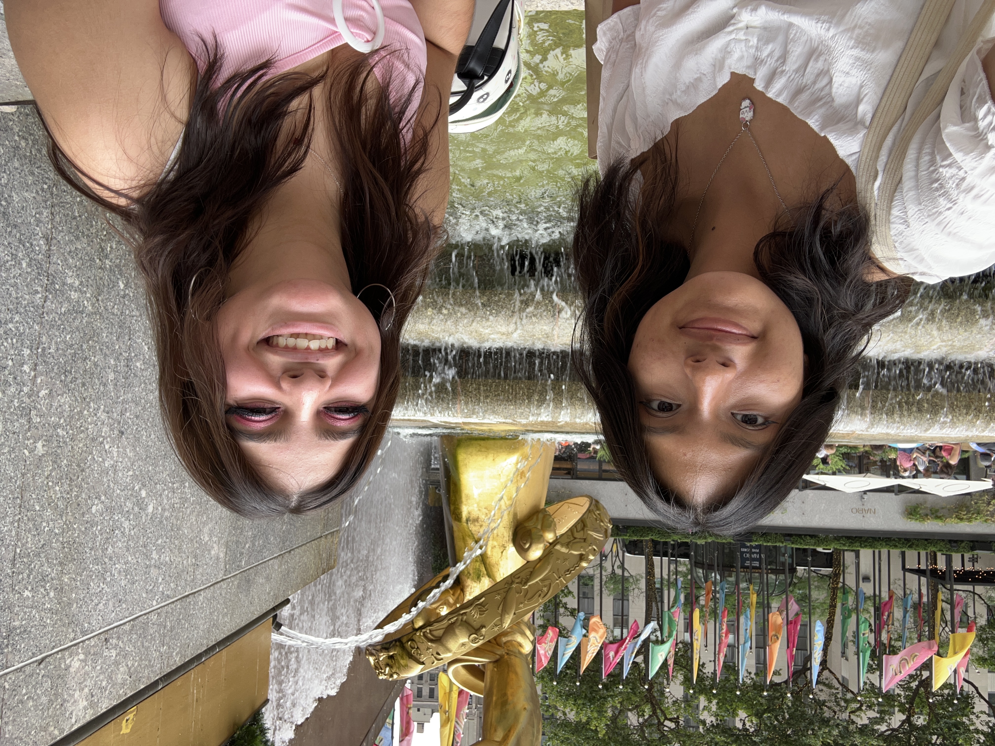 my friend and I outside Rockefeller Center