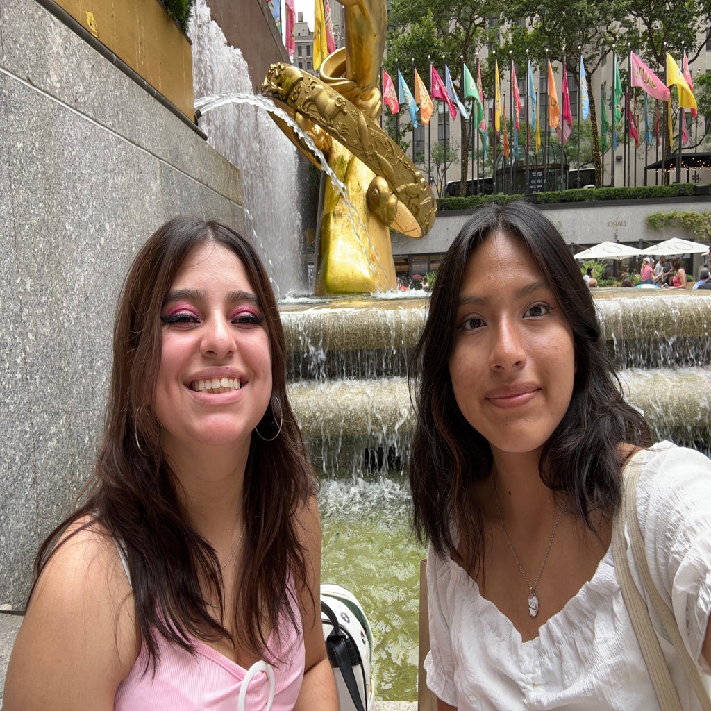 my friend and I outside Rockefeller Center