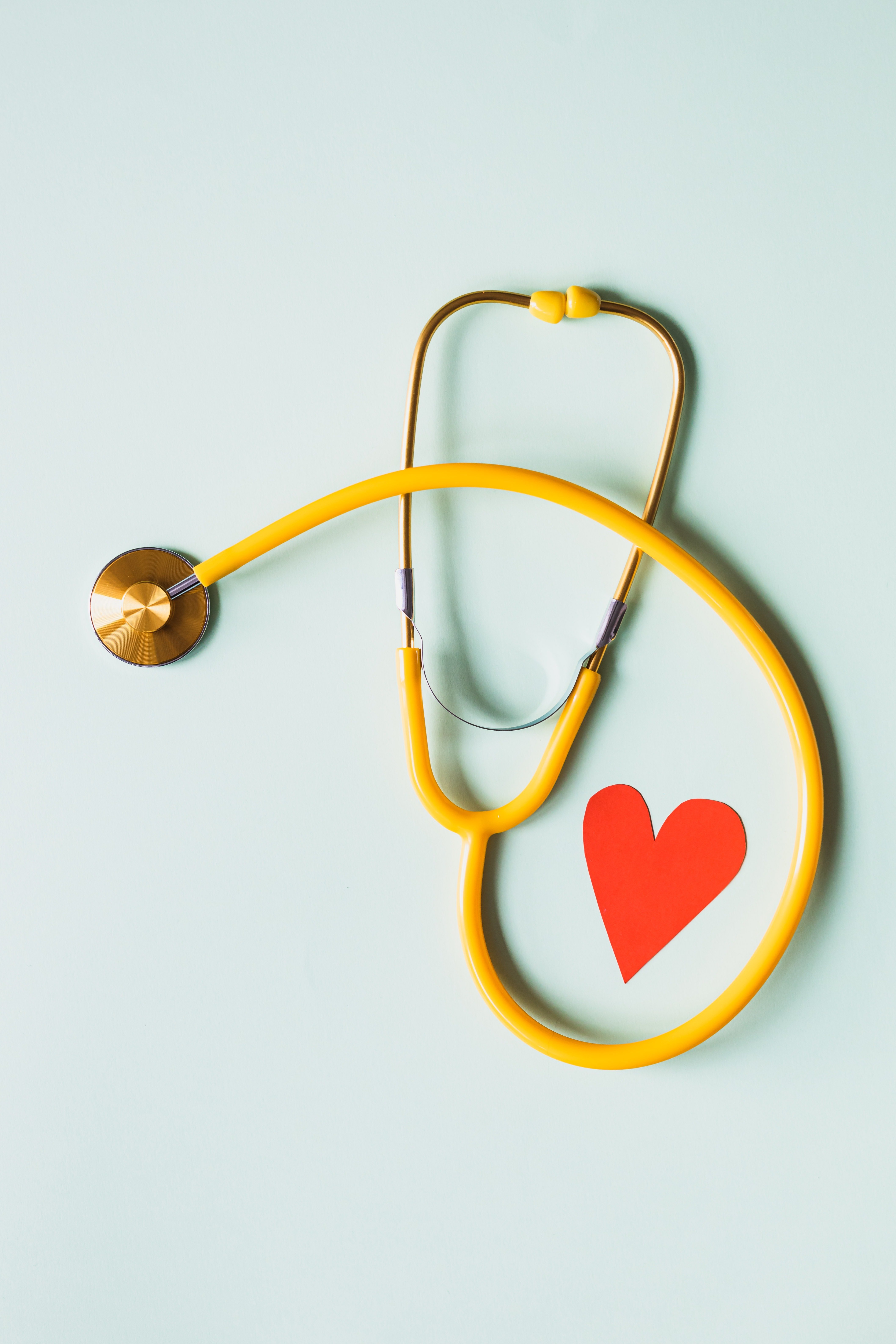 Yellow Stethoscope with red heart by Karolina Grabowska?width=698&height=466&fit=crop&auto=webp&dpr=4