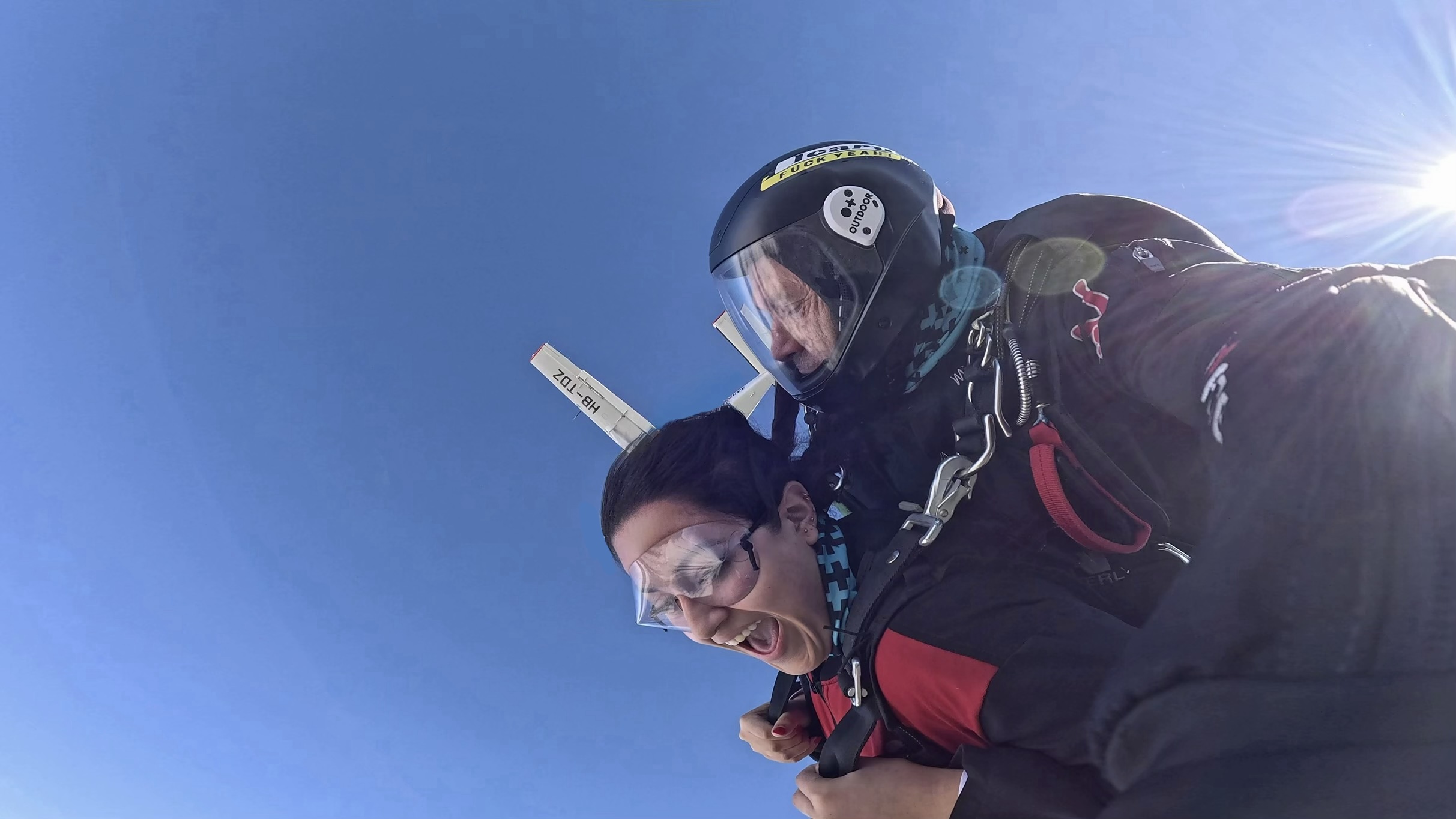 person jumping out of plane