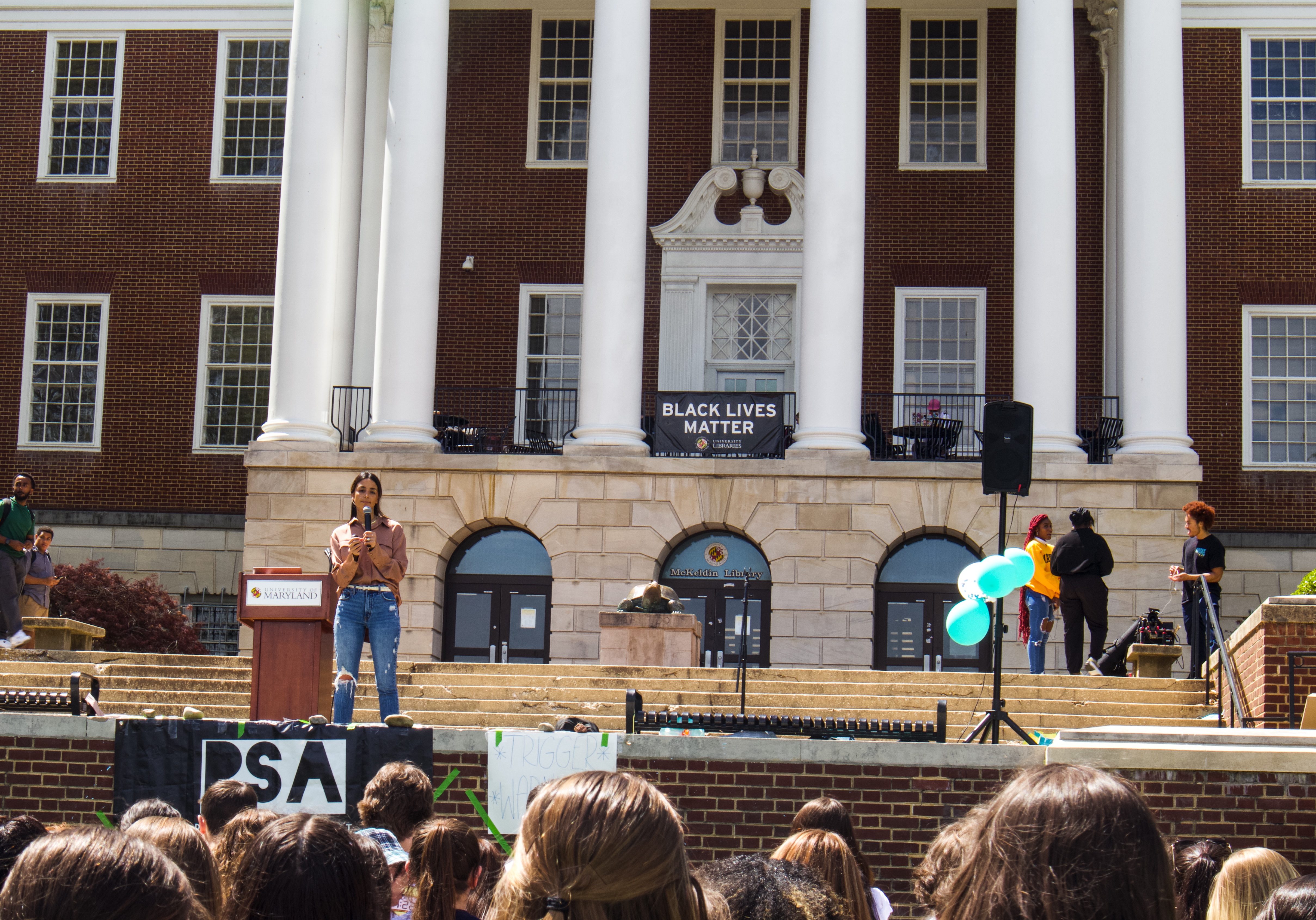 Speaker, Brittany Piper, talks to crowd