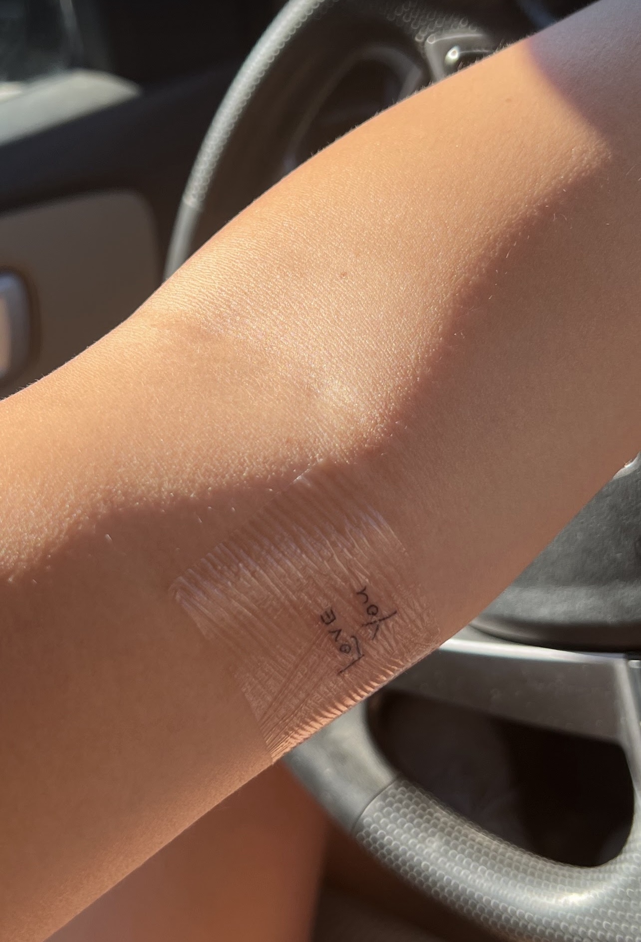 Tattoo of my grandfather\'s writing on my arm