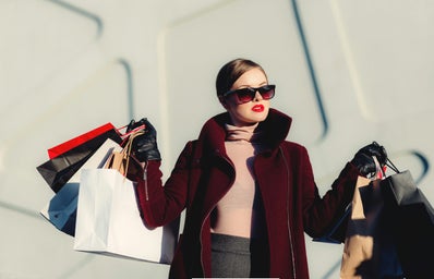 woman carrying shoopping bags