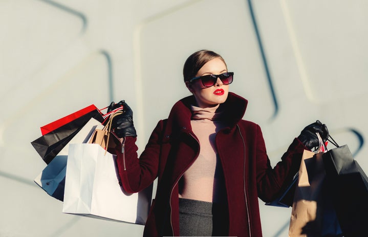 woman carrying shoopping bags