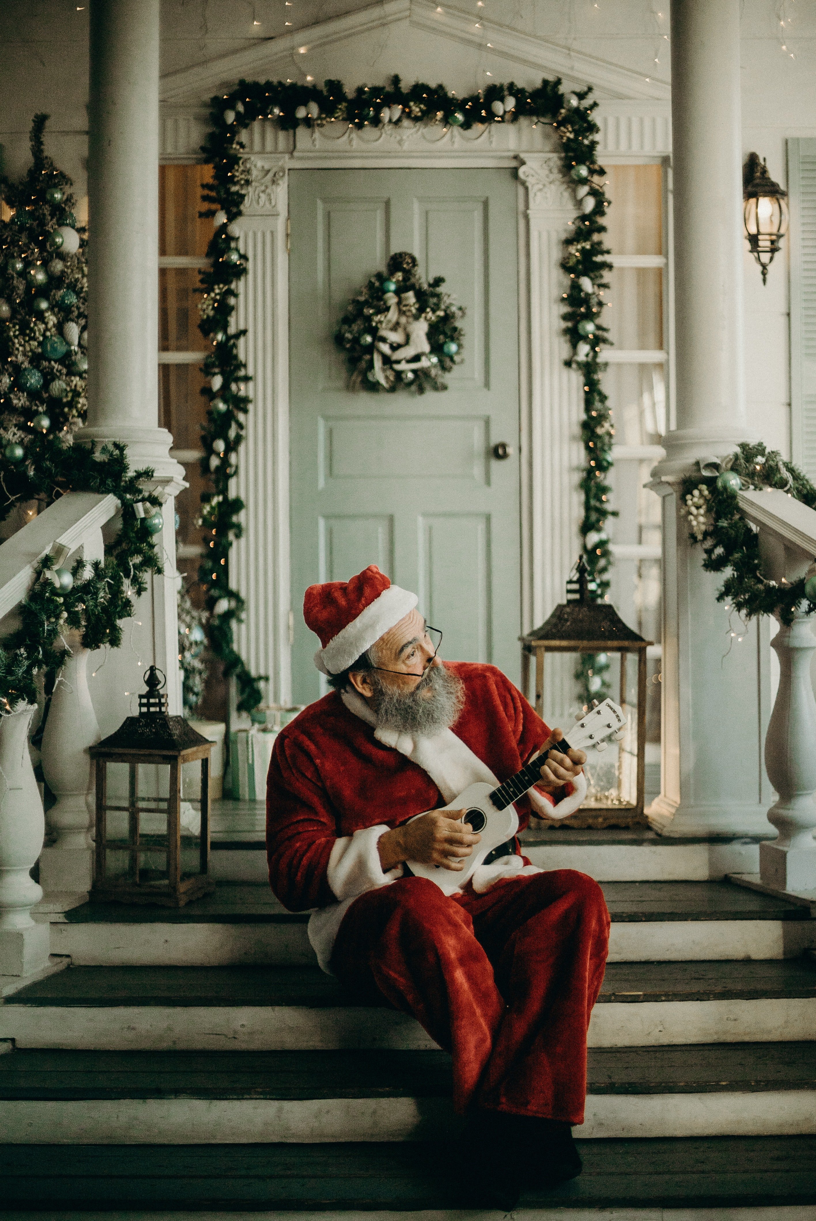 santa claus on decorated porch by cottonbro?width=698&height=466&fit=crop&auto=webp&dpr=4