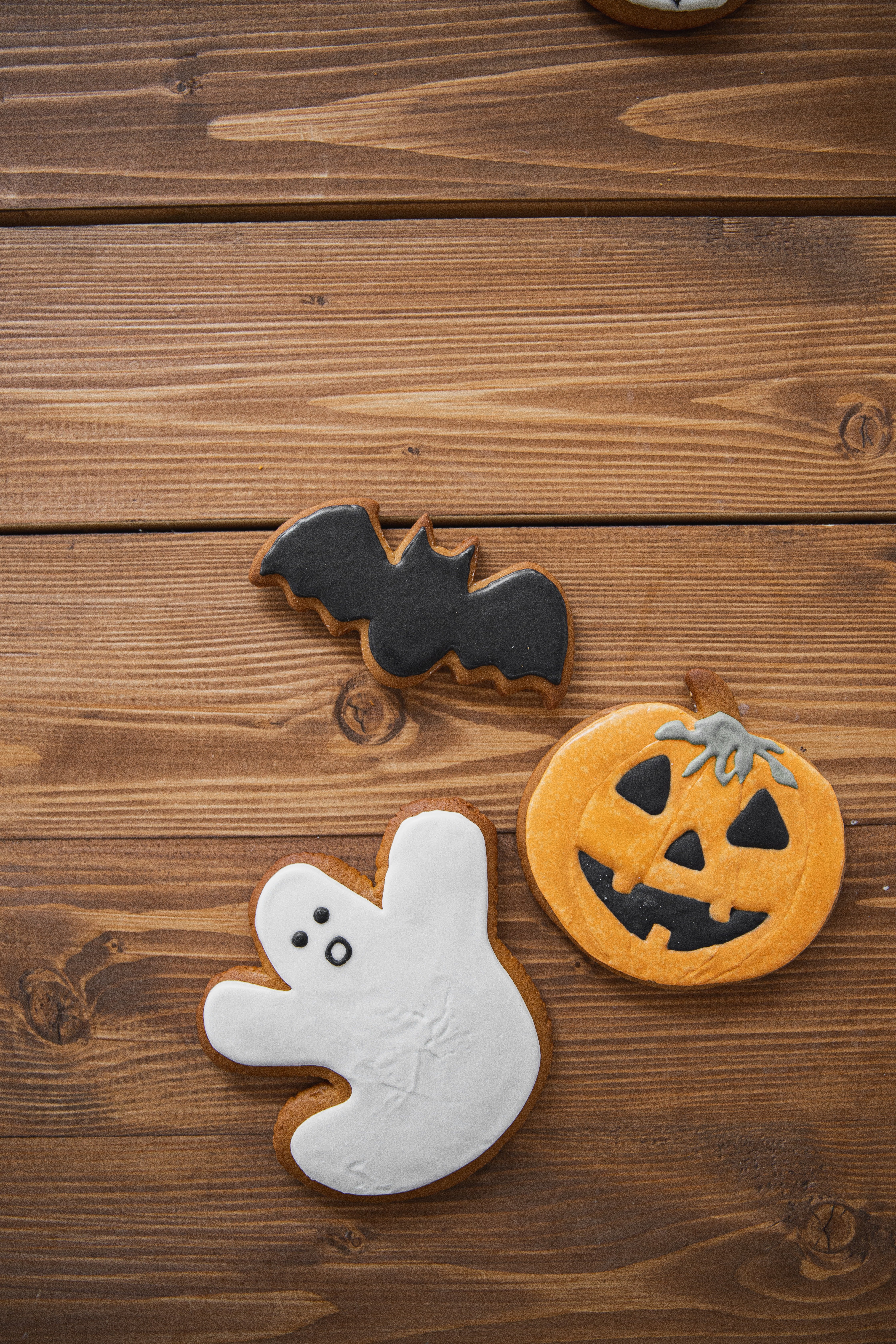 Halloween Cookies On Wooden Surface