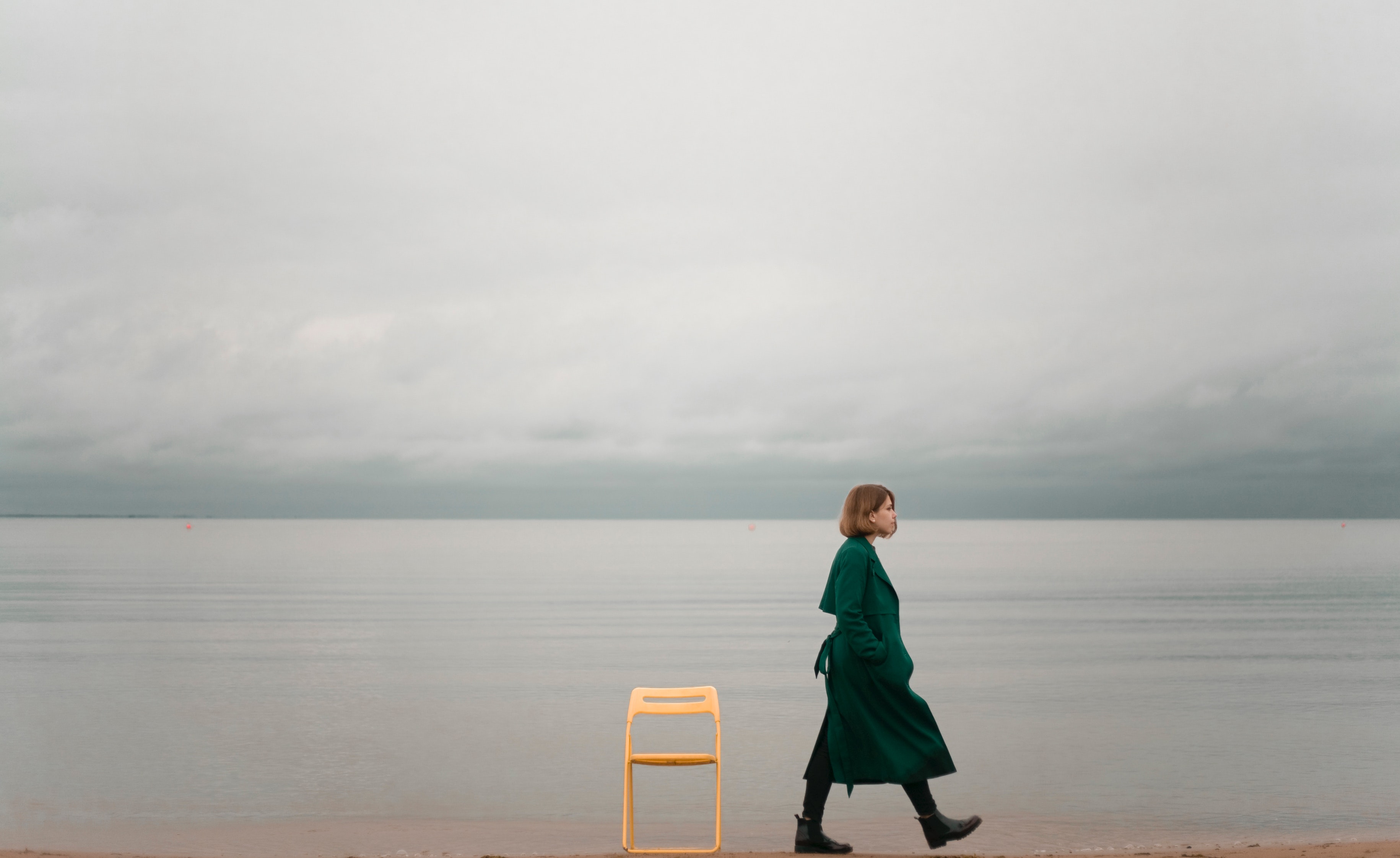 Woman walking beside beach