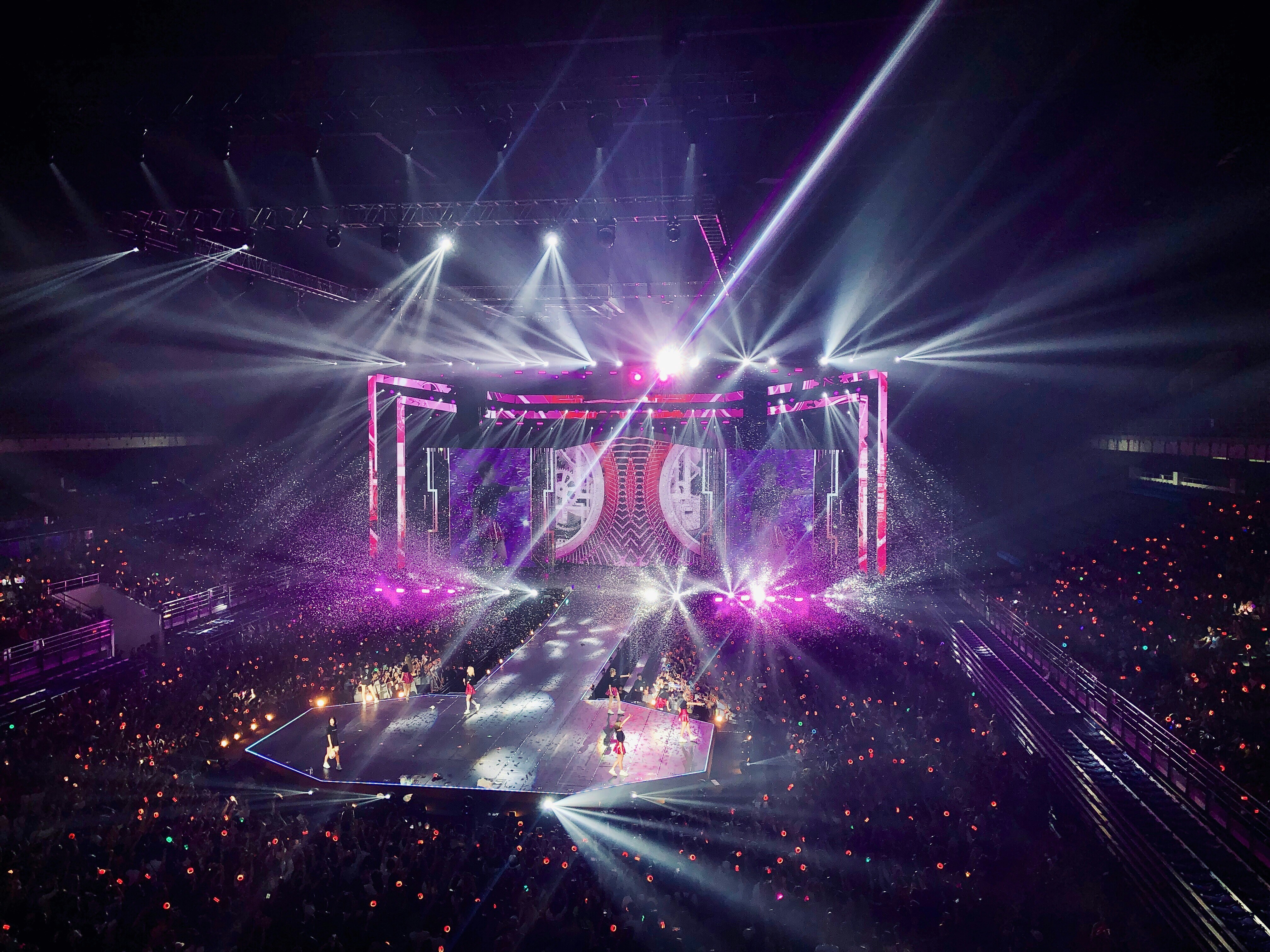 people around a stage performance