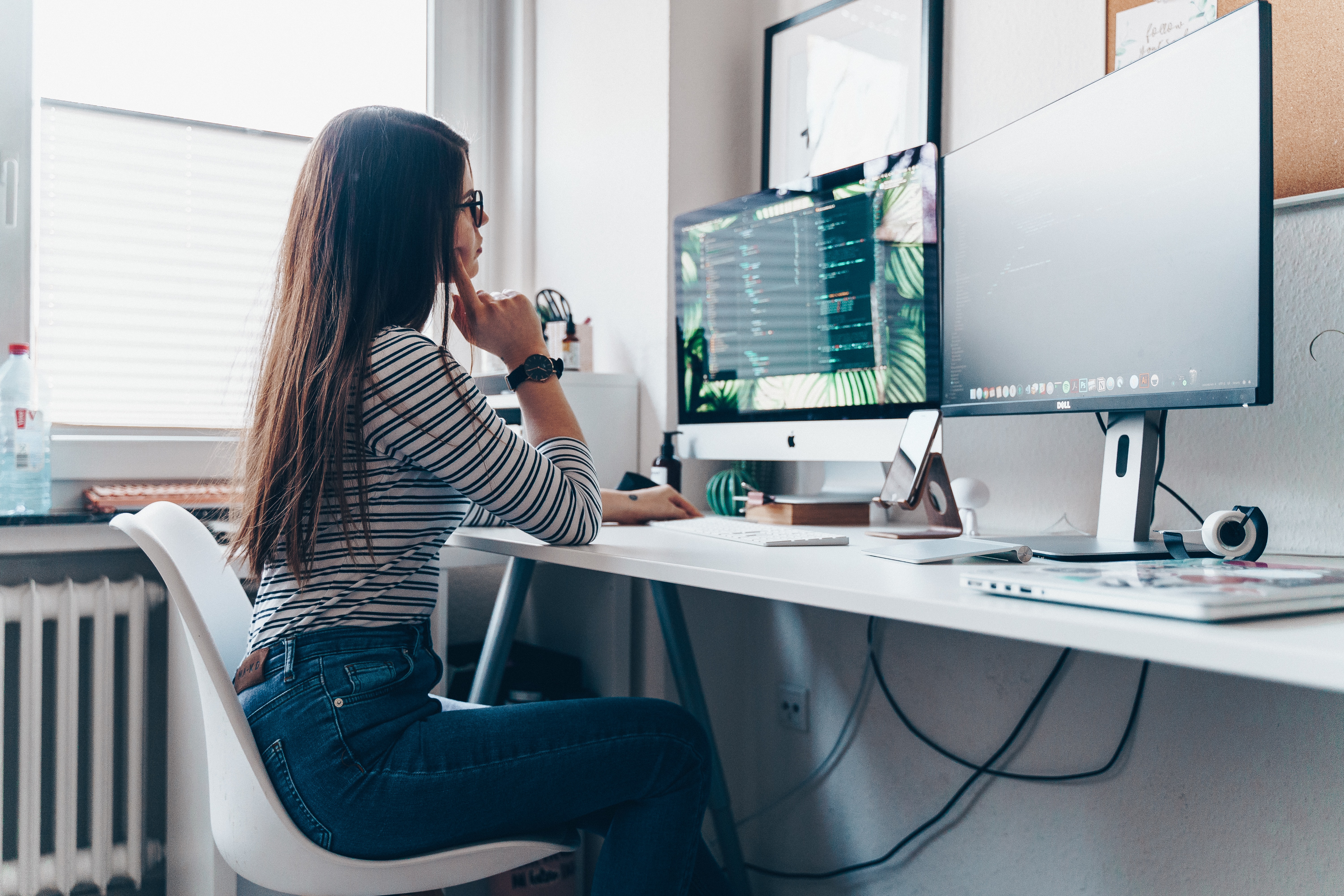 Woman working at desktop computer