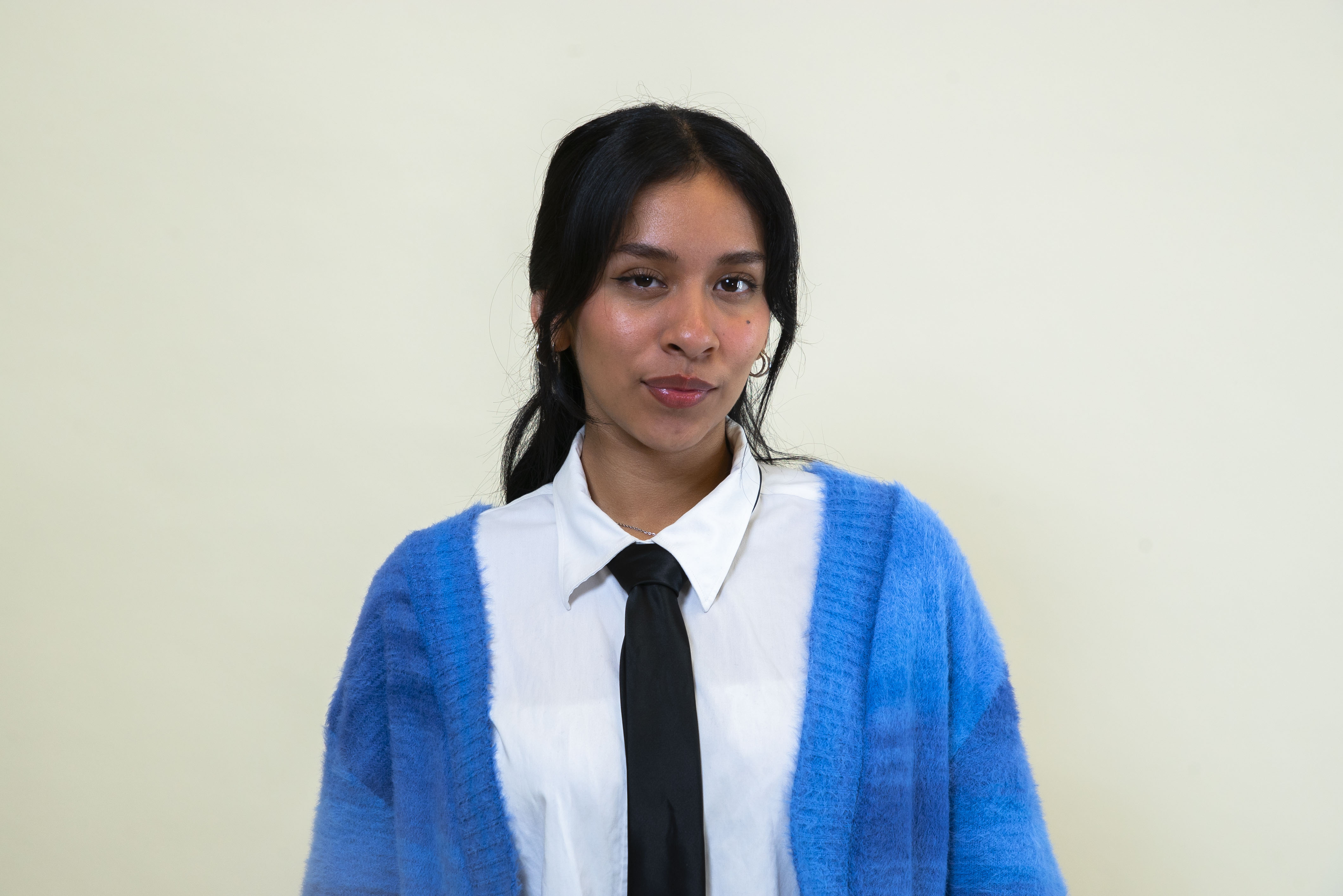 girl in front of wall