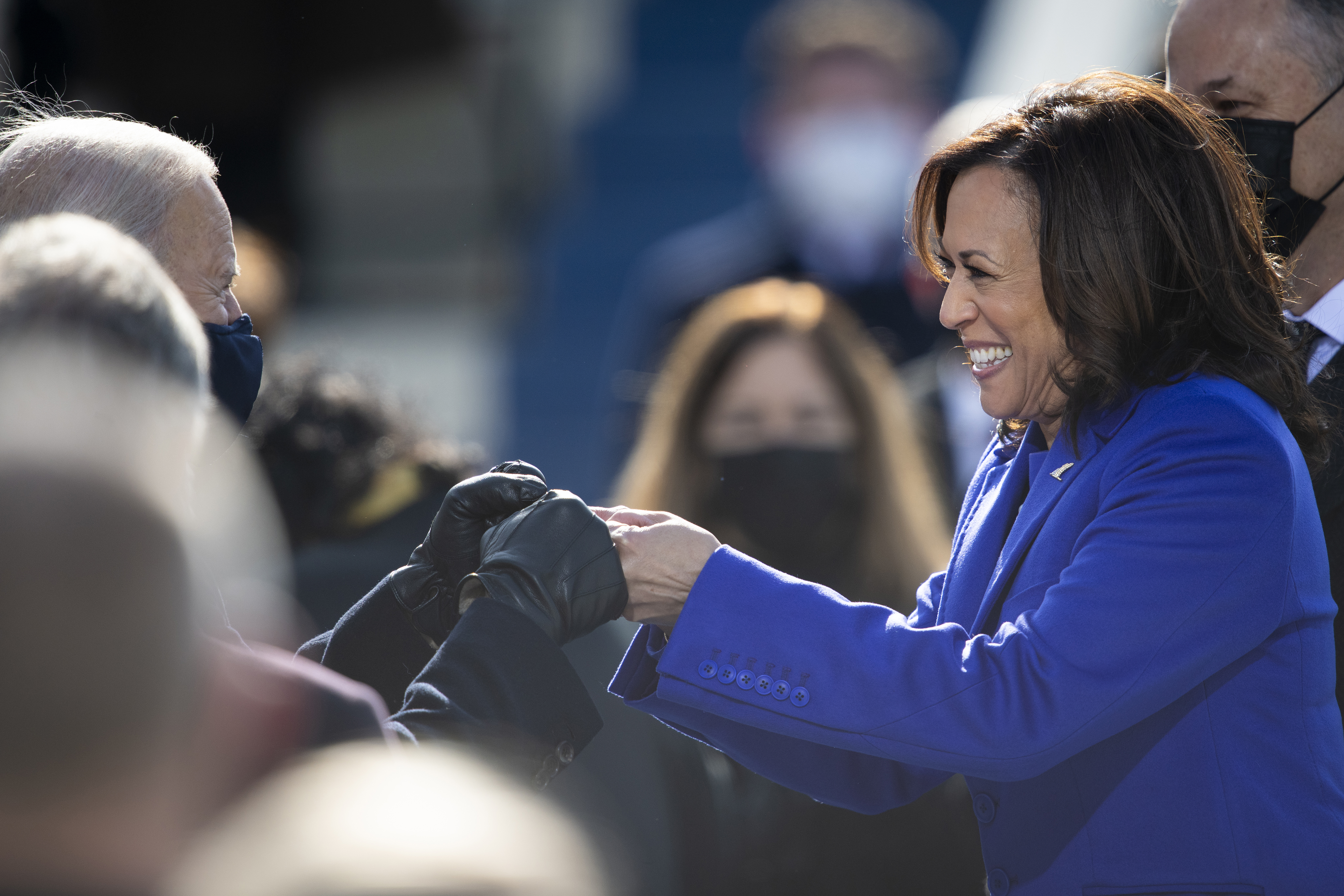 Kamala Harris and Joe Biden bump fists during the 2021 presidential inauguration