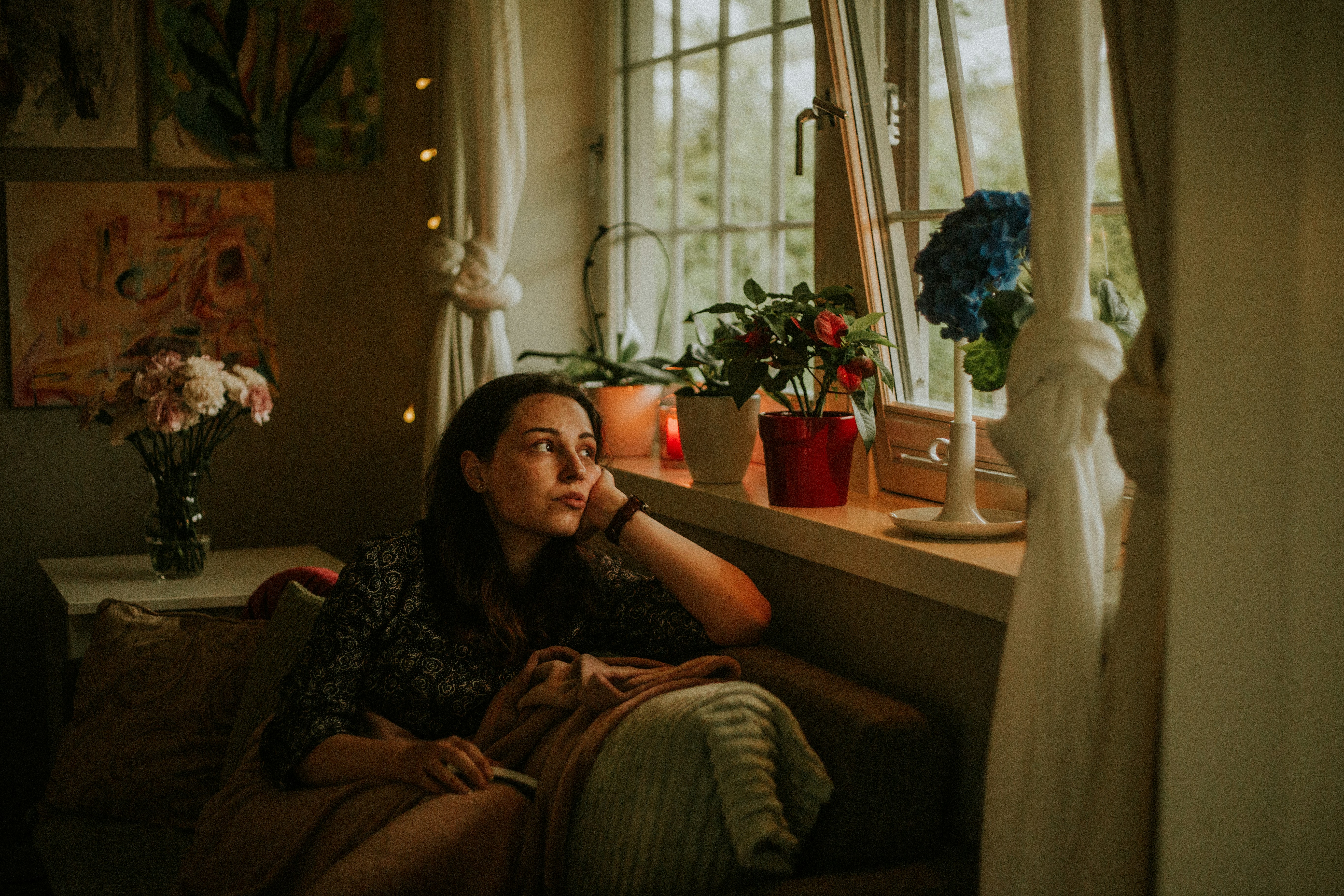 woman sitting by window