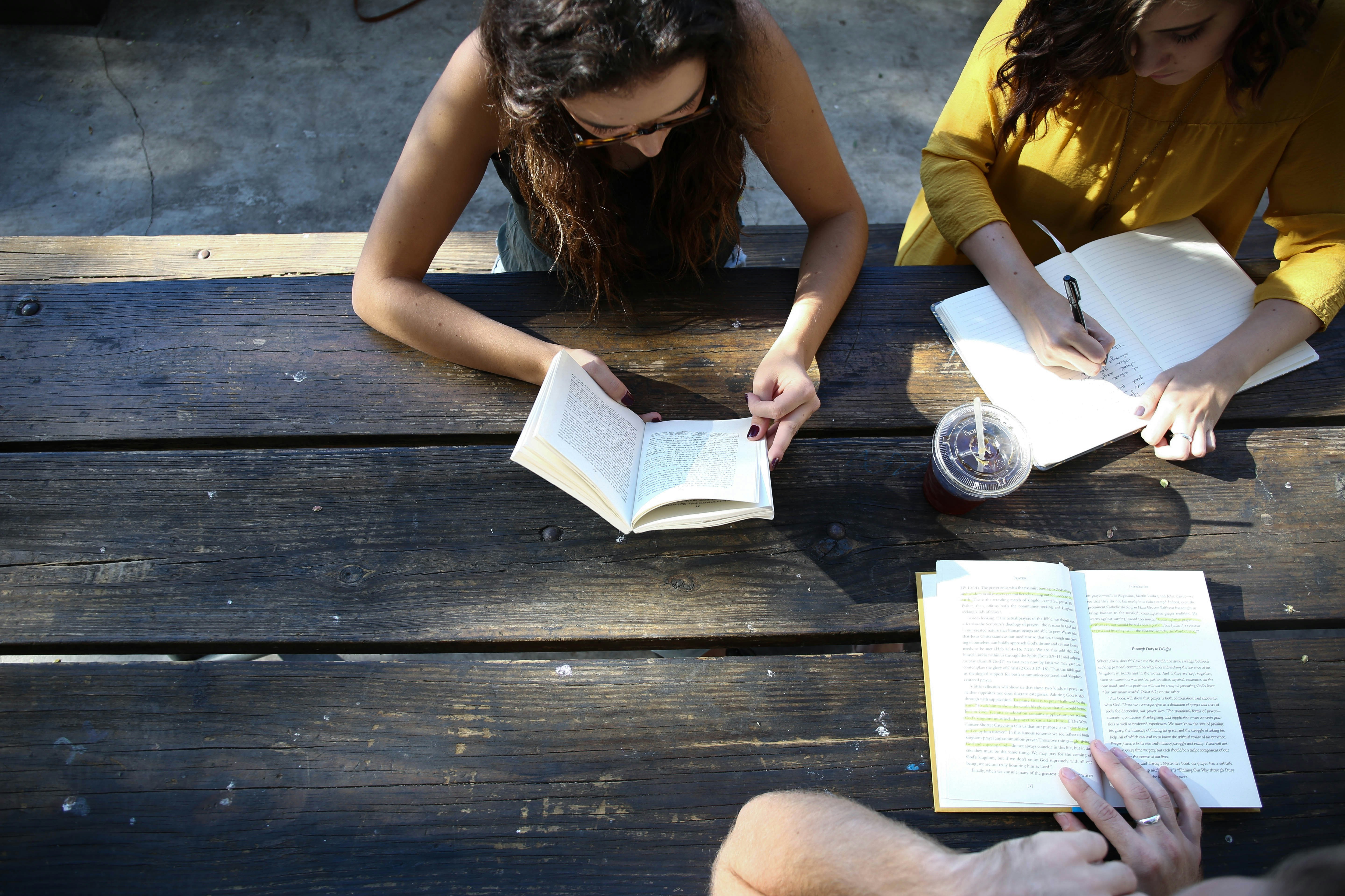 used in search bar: college girl (three girls sitting at a table together. website tags: people images & pictures, website backgrounds, friend)