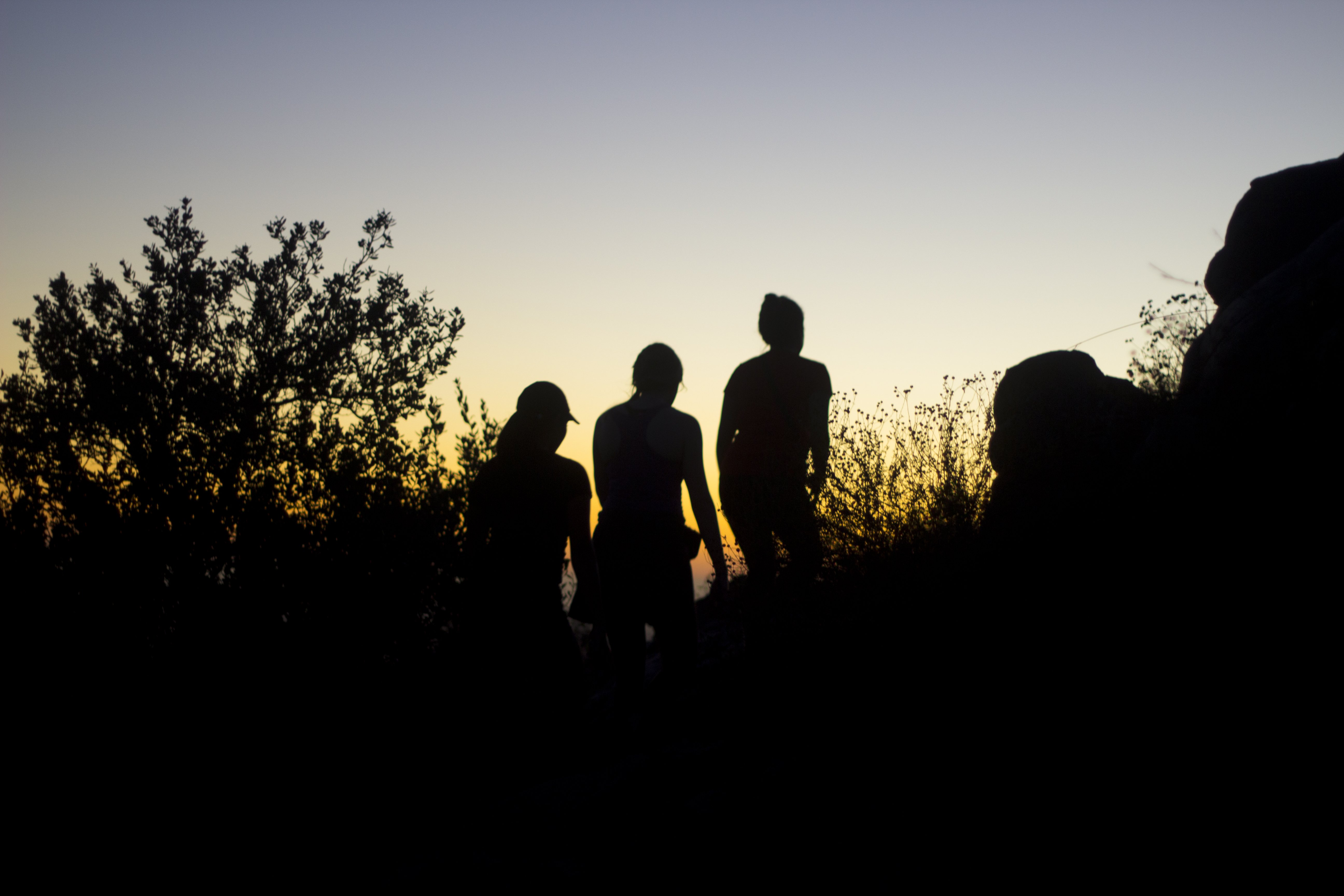 friends girls hike sunset mountains adventure silhouette