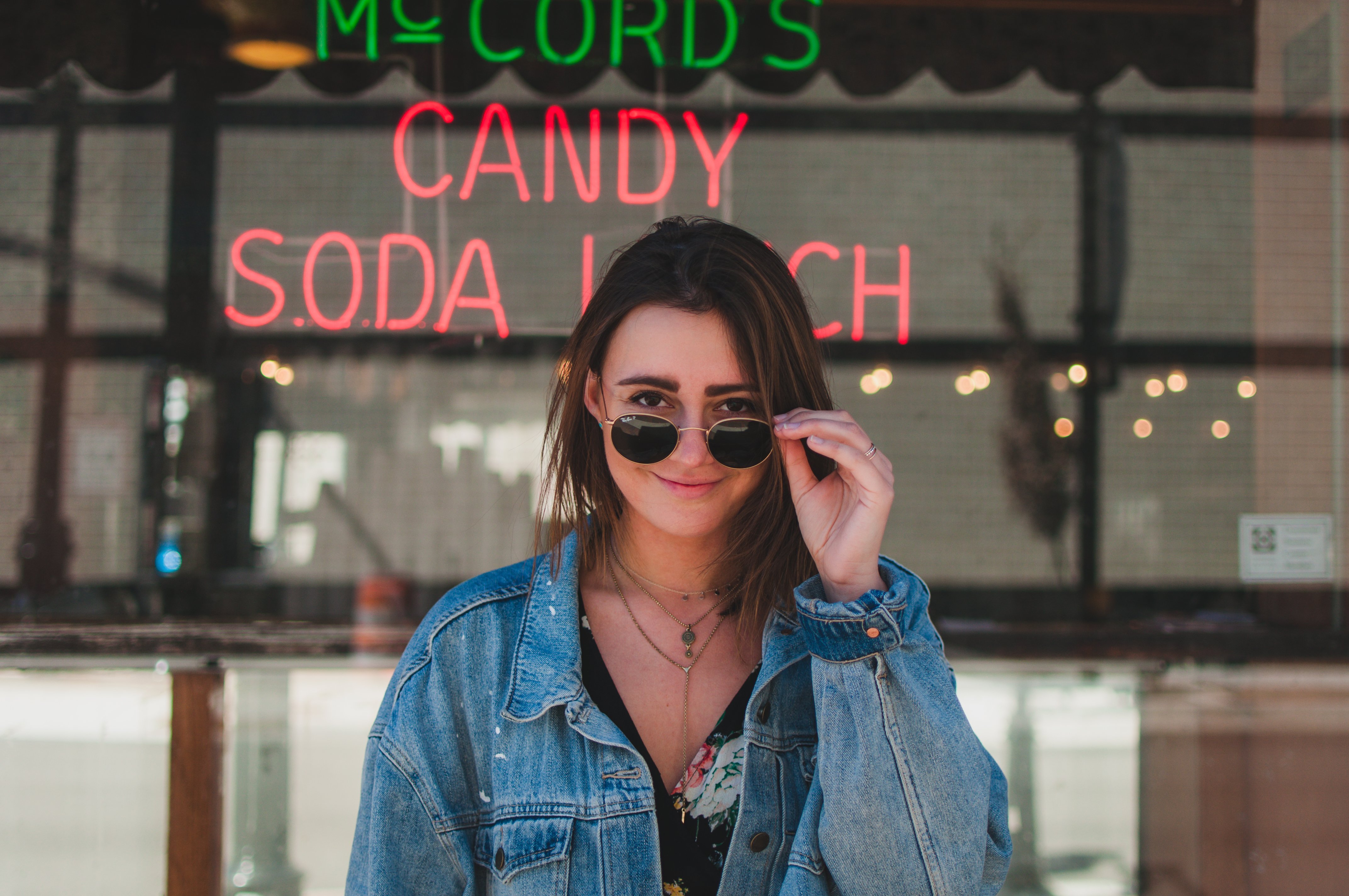 taylor thoman girl with jean jacket in front of diner?width=698&height=466&fit=crop&auto=webp&dpr=4