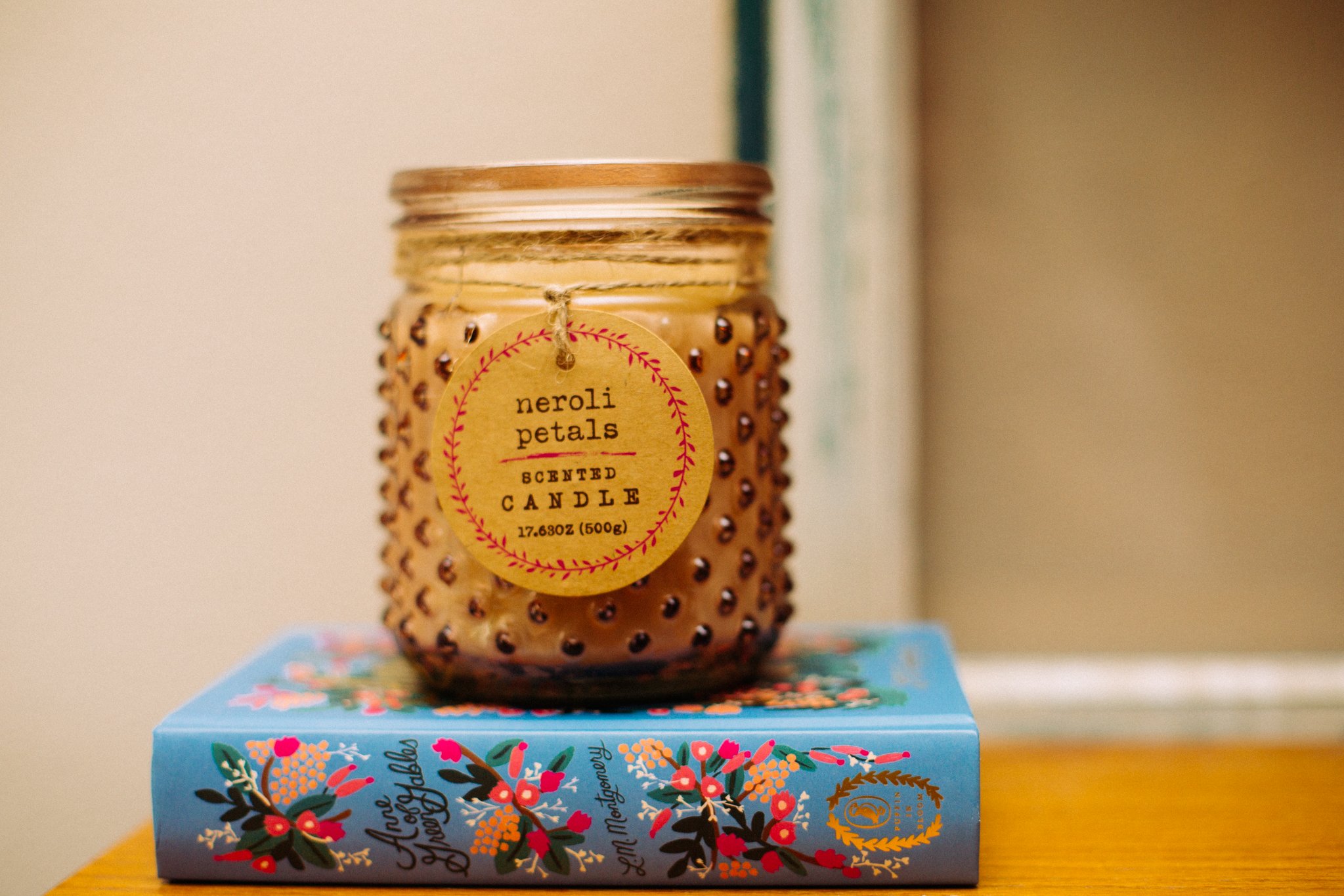 Candle Sitting On Book