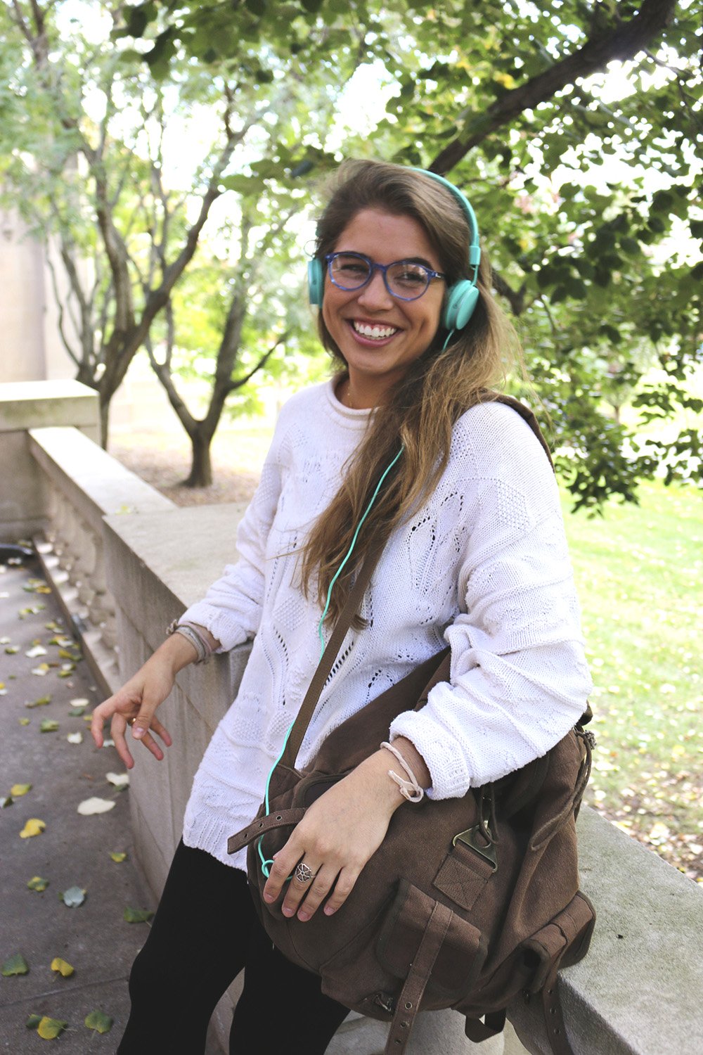 the lala girl with brown backpack and headphones?width=698&height=466&fit=crop&auto=webp&dpr=4