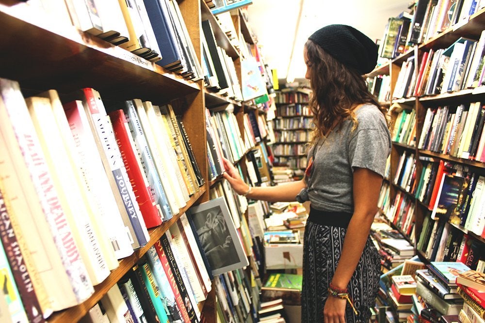 The Lalagirl Looking Through Books