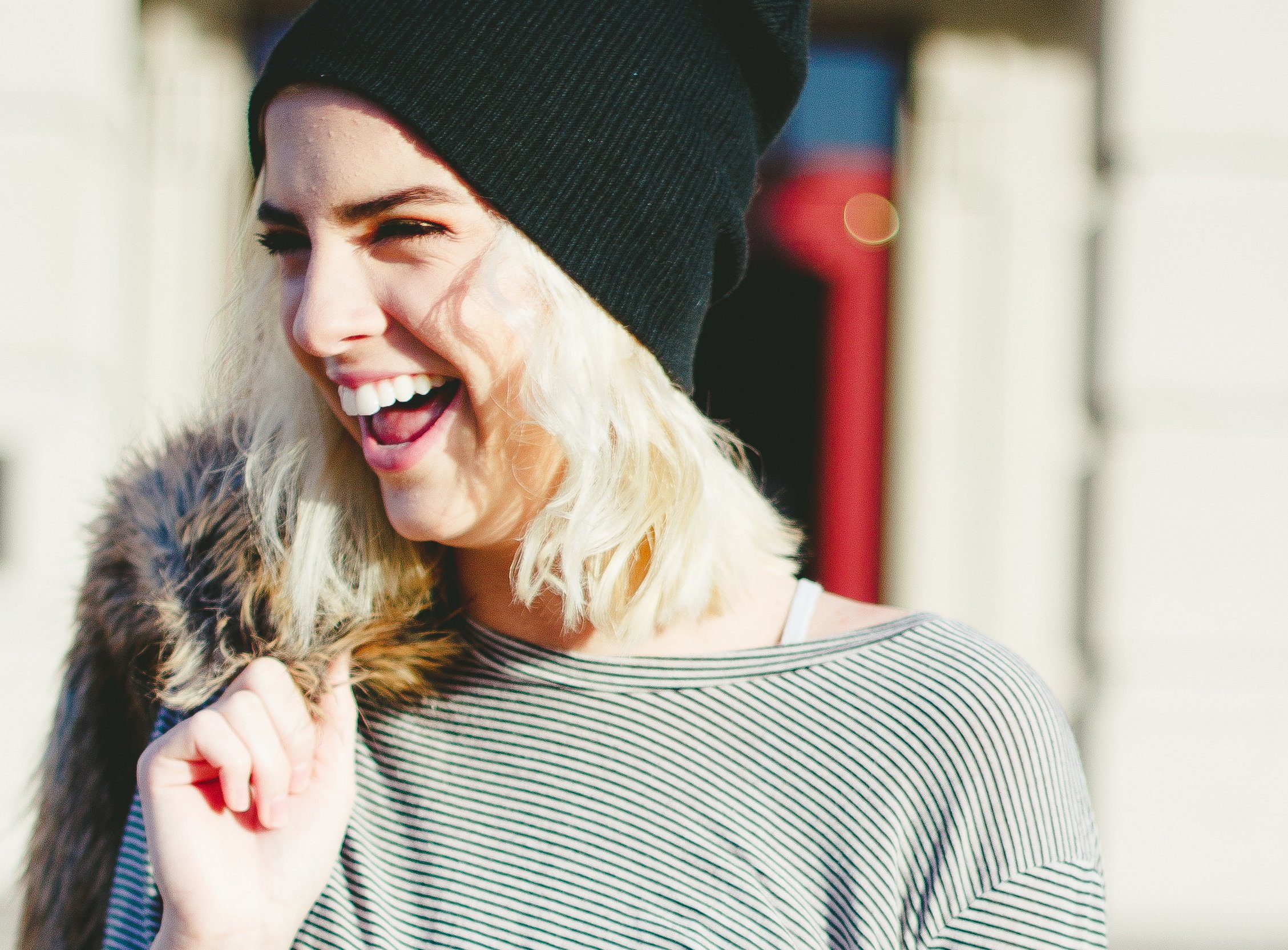 arianna tucker girl laughing with beanie?width=698&height=466&fit=crop&auto=webp&dpr=4