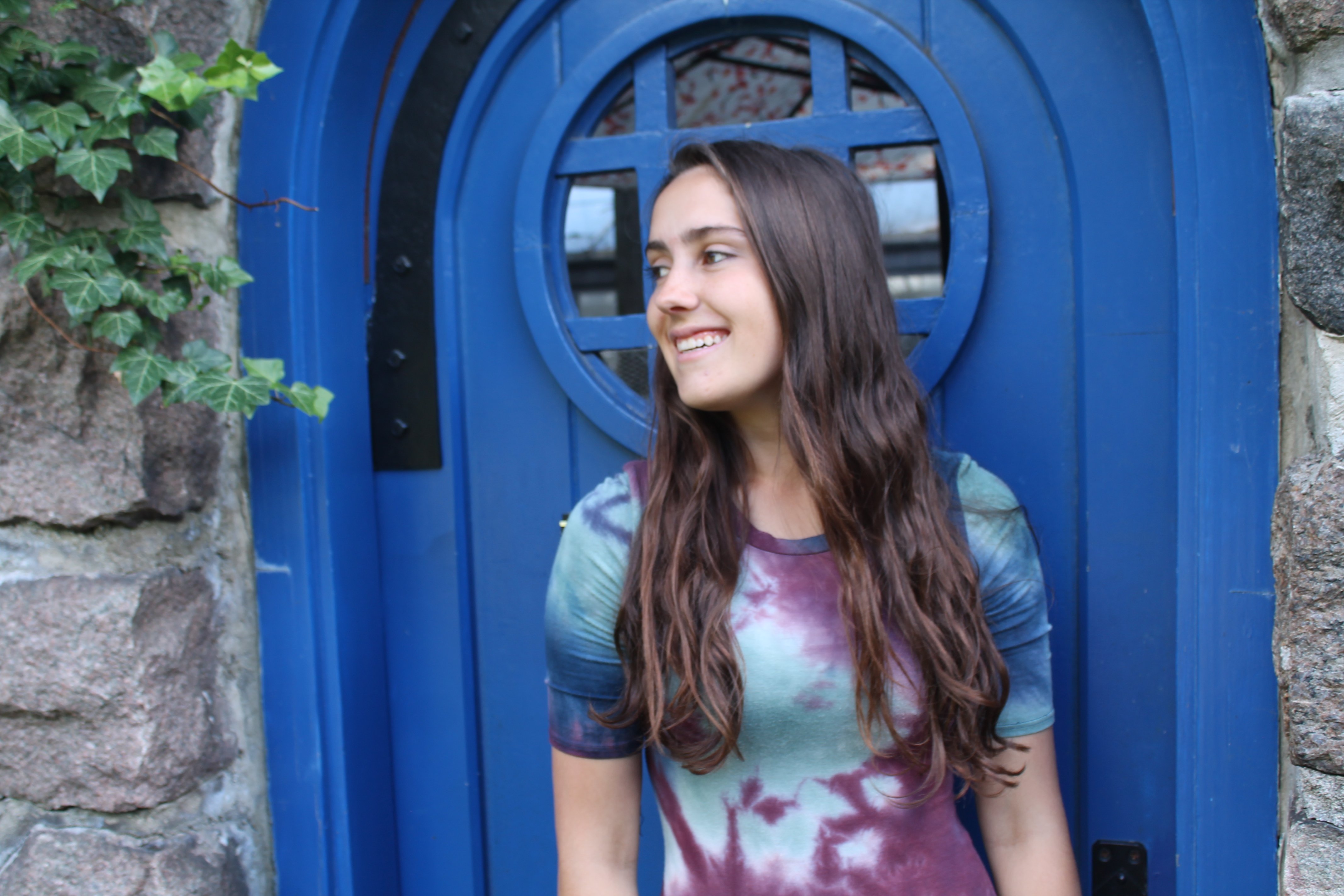 Girl Smiling Blue Door Tye Dye Dress Fun