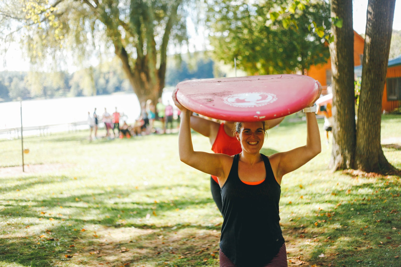 Kayla Bacon-Carrying Surfboard 1