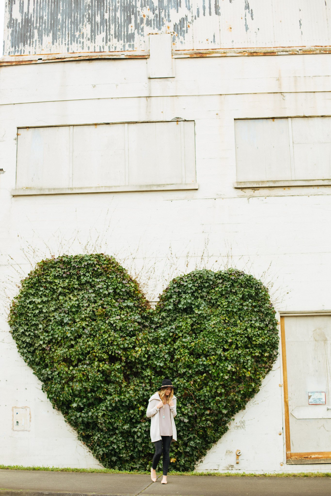breanna coon girl in front of heart shrub?width=698&height=466&fit=crop&auto=webp&dpr=4
