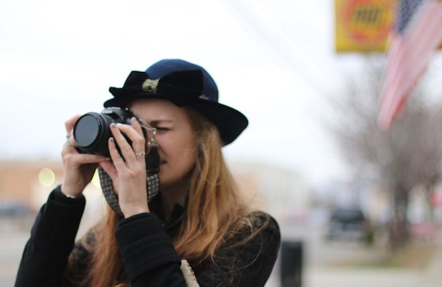 the lala girl in hat taking a photo?width=698&height=466&fit=crop&auto=webp&dpr=4