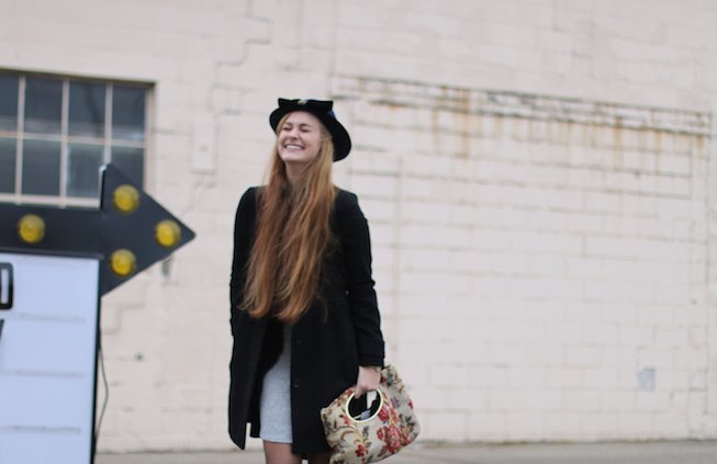 The Lalagirl In Hat And Coat Laughing