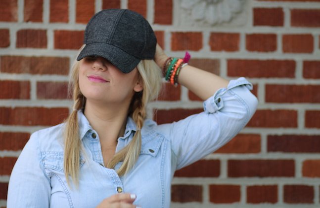 The Lalagirl In Gray Baseball Cap And Pigtails