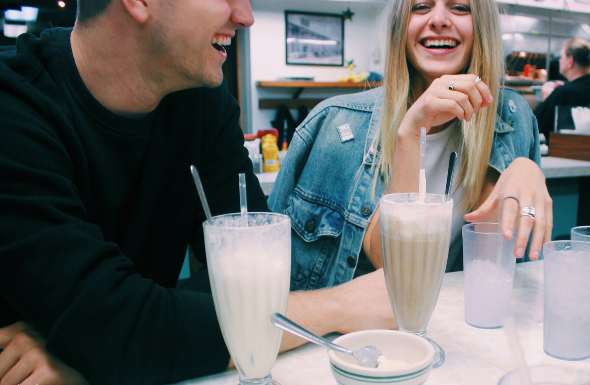 Anna Schultz girl and guy couple laughing with milkshakes?width=698&height=466&fit=crop&auto=webp&dpr=4