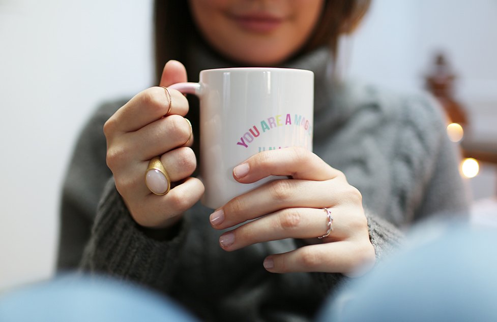 the lala holding coffee mug?width=698&height=466&fit=crop&auto=webp&dpr=4