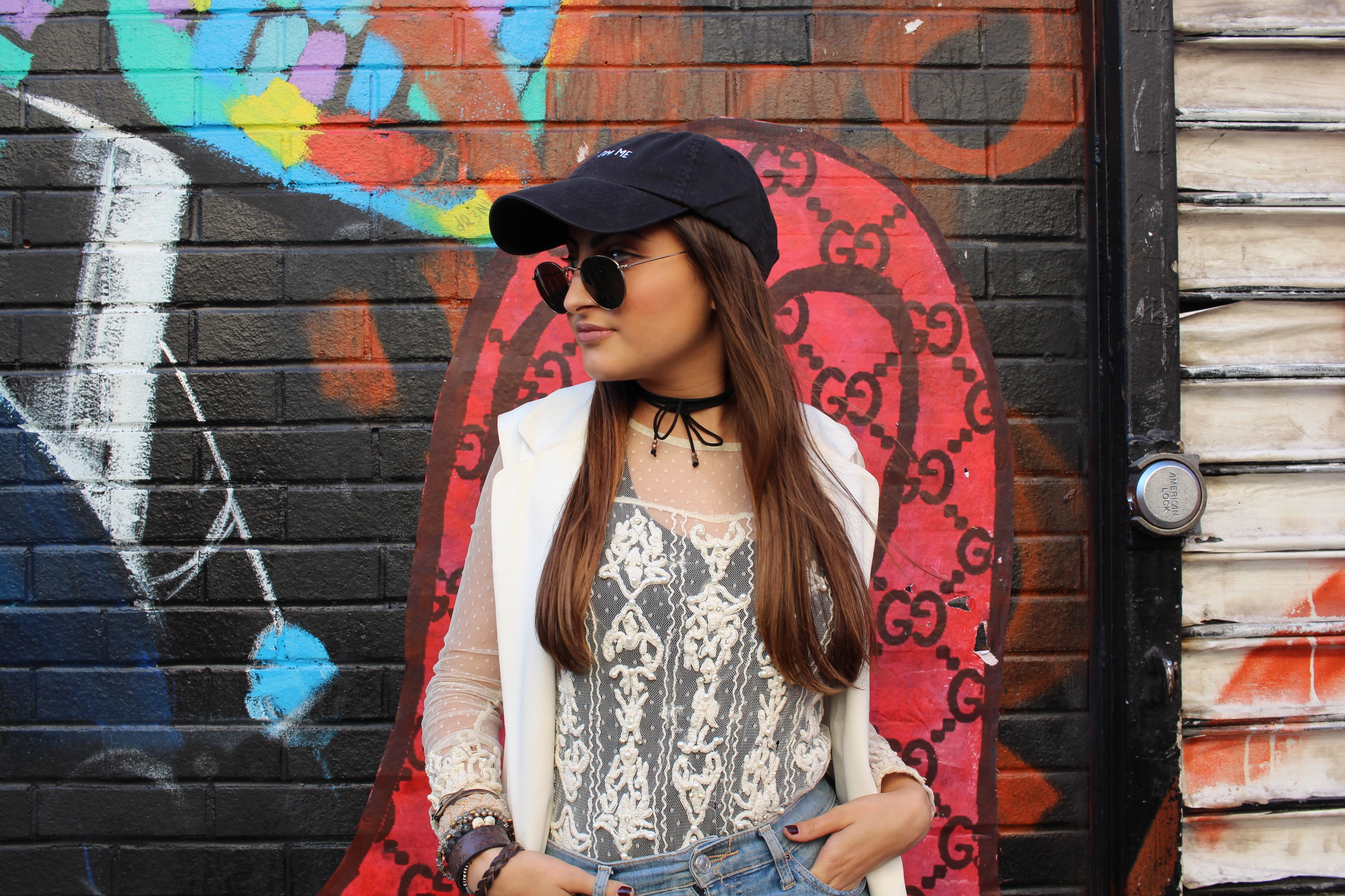 Girl In Baseball Cap Against Mural Ootd 2