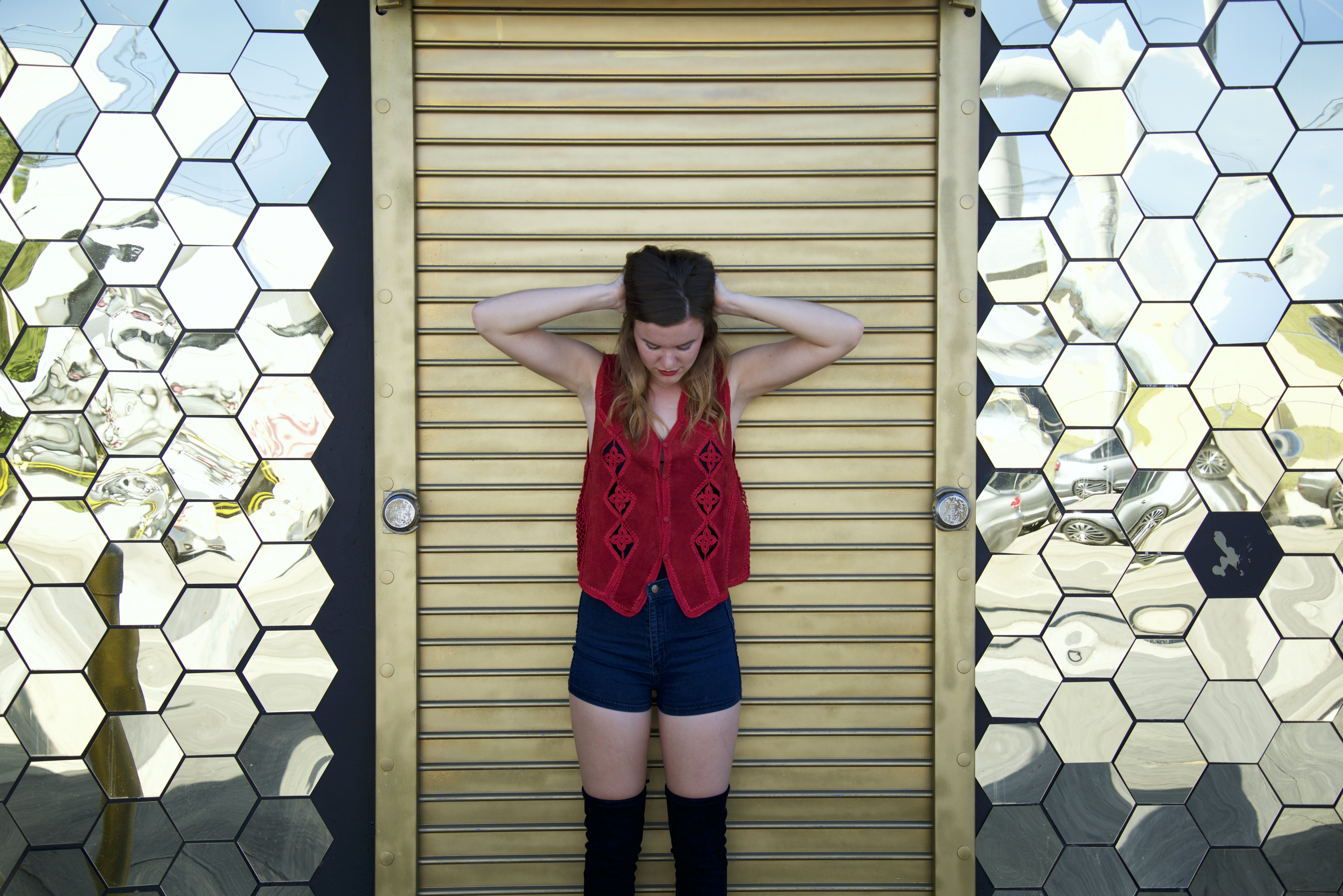 Lindsay Thompson-Miami Mirror Walls Vest Serious Stressed
