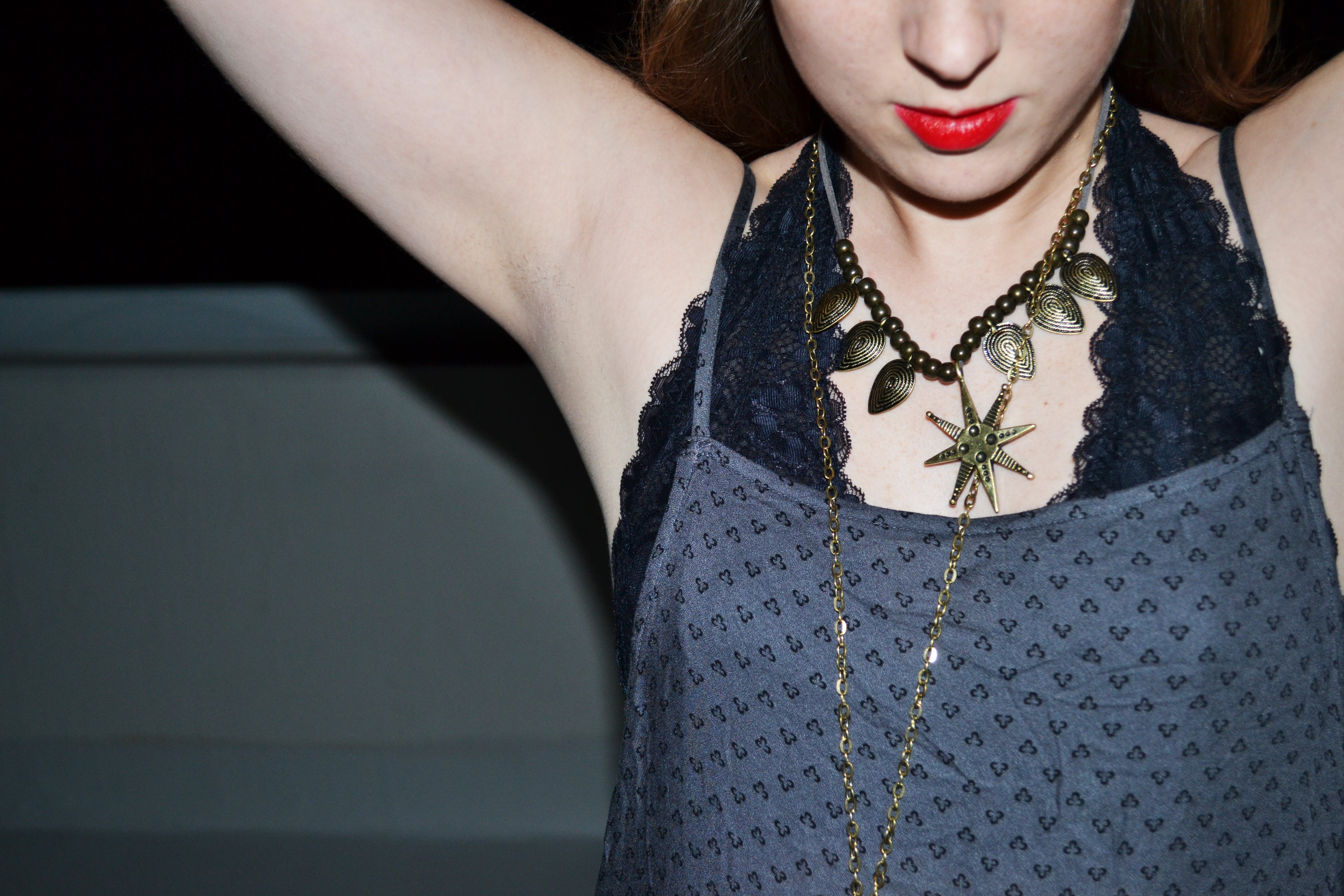 Girl In Black Outfit And Layered Necklaces