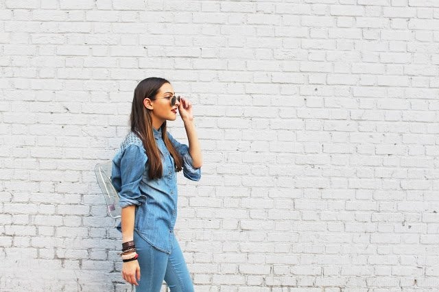 Girl In All Denim With White Wall