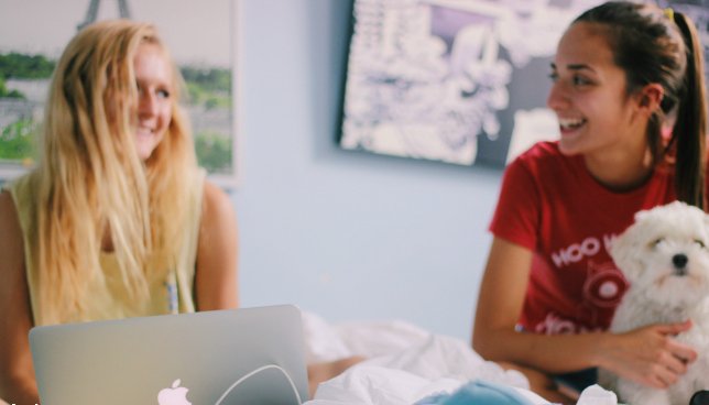 Anna Schultz girls smiling hanging out with dog?width=698&height=466&fit=crop&auto=webp&dpr=4