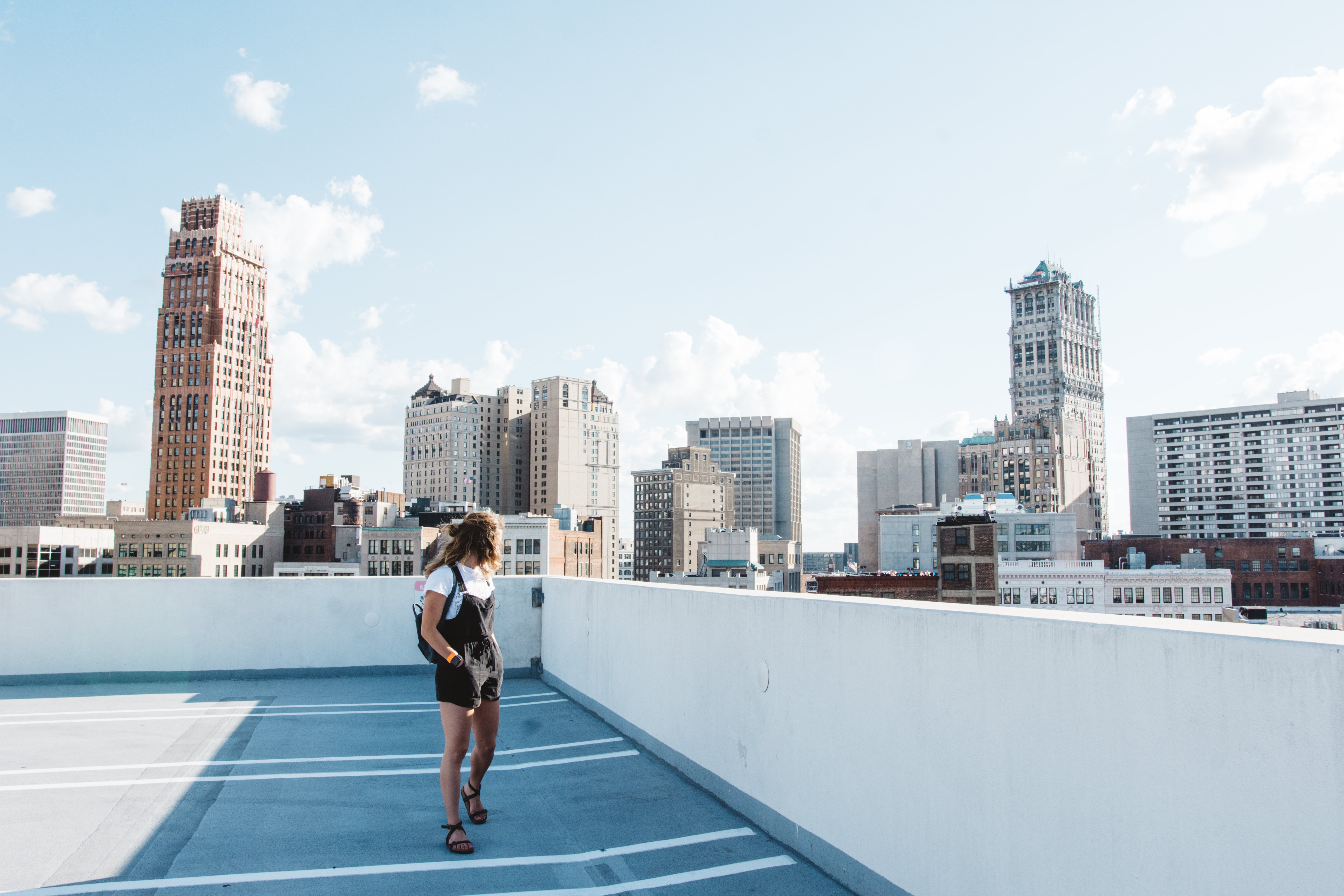 Cameron Smith city skyline detroit michigan girl overalls street buildings skyscrapers 1?width=698&height=466&fit=crop&auto=webp&dpr=4