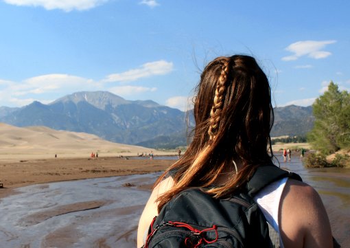 charlotte reader girl mountains sand summer adventure roadtrip braid backpack creek?width=698&height=466&fit=crop&auto=webp&dpr=4