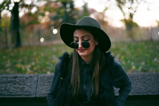 Girl In All Black With Hat And Sunglasses