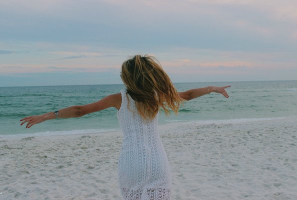 Anna Schultz running into ocean arms outstretched inspirational?width=698&height=466&fit=crop&auto=webp&dpr=4