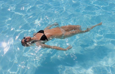 Anna Schultz-Girl Relaxing In Pool