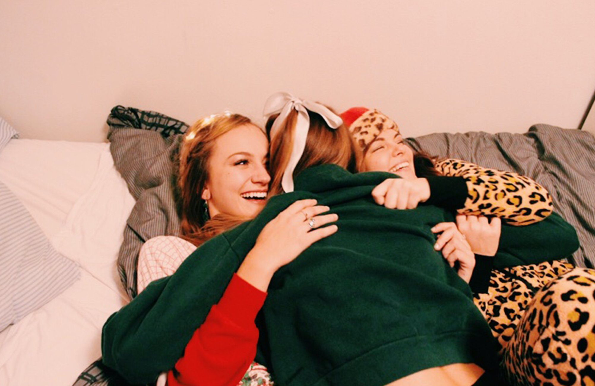 Anna Schultz friends cuddling in holiday pajamas?width=698&height=466&fit=crop&auto=webp&dpr=4