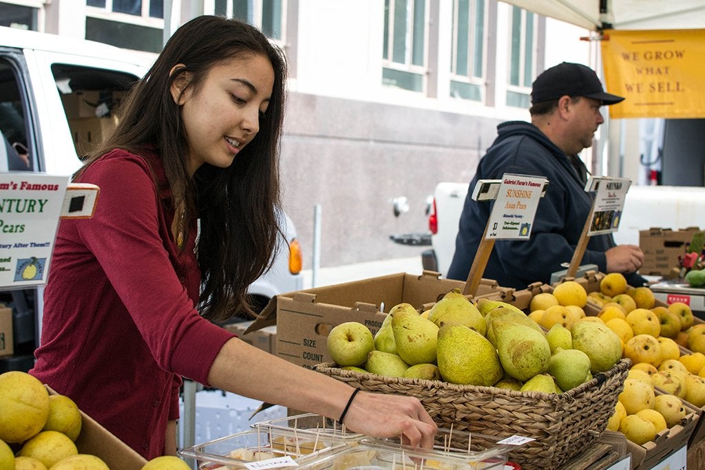 Farmers Market Test Fruit Girl