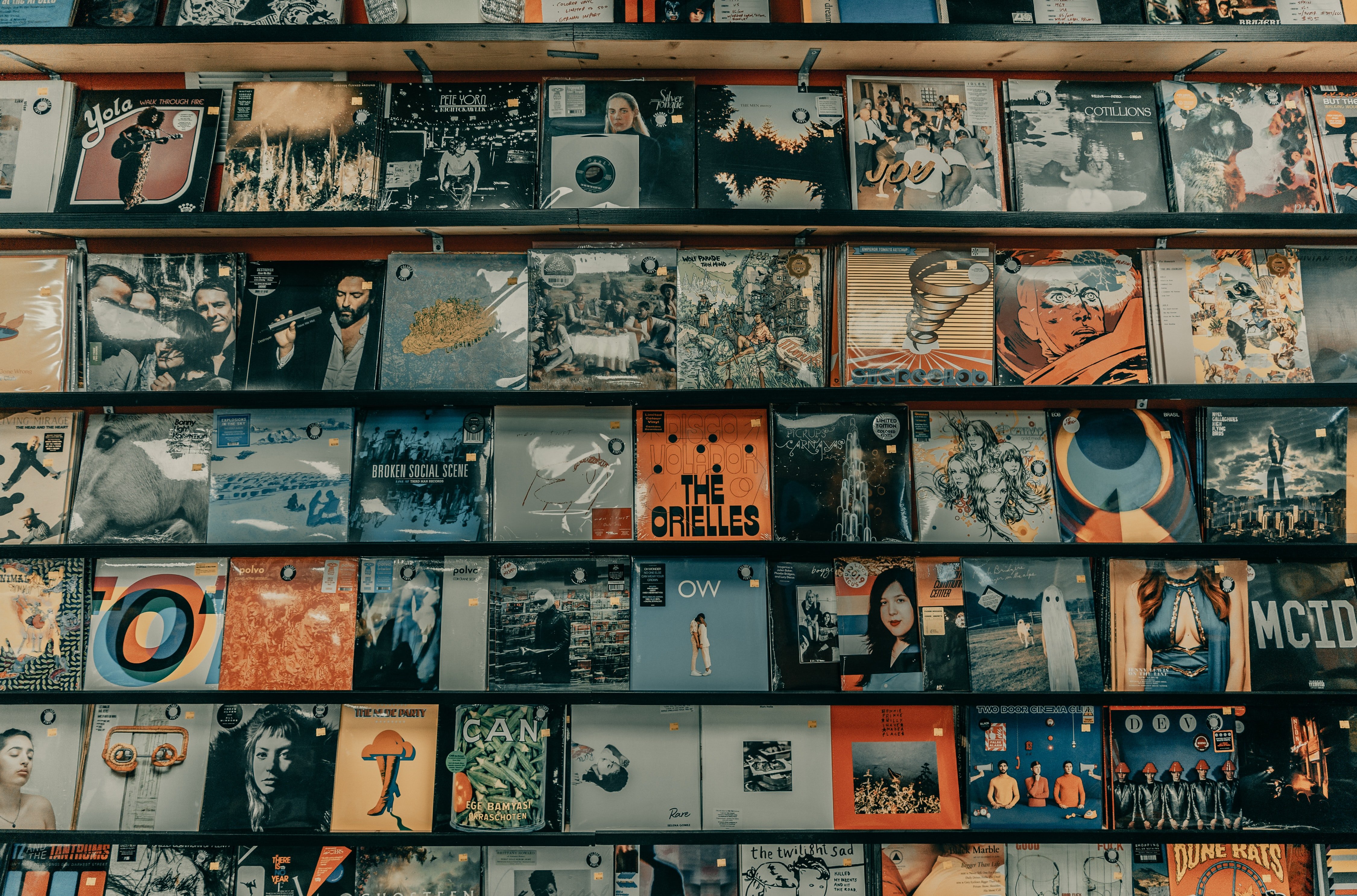 vinyl records on wall by Unsplash?width=698&height=466&fit=crop&auto=webp&dpr=4