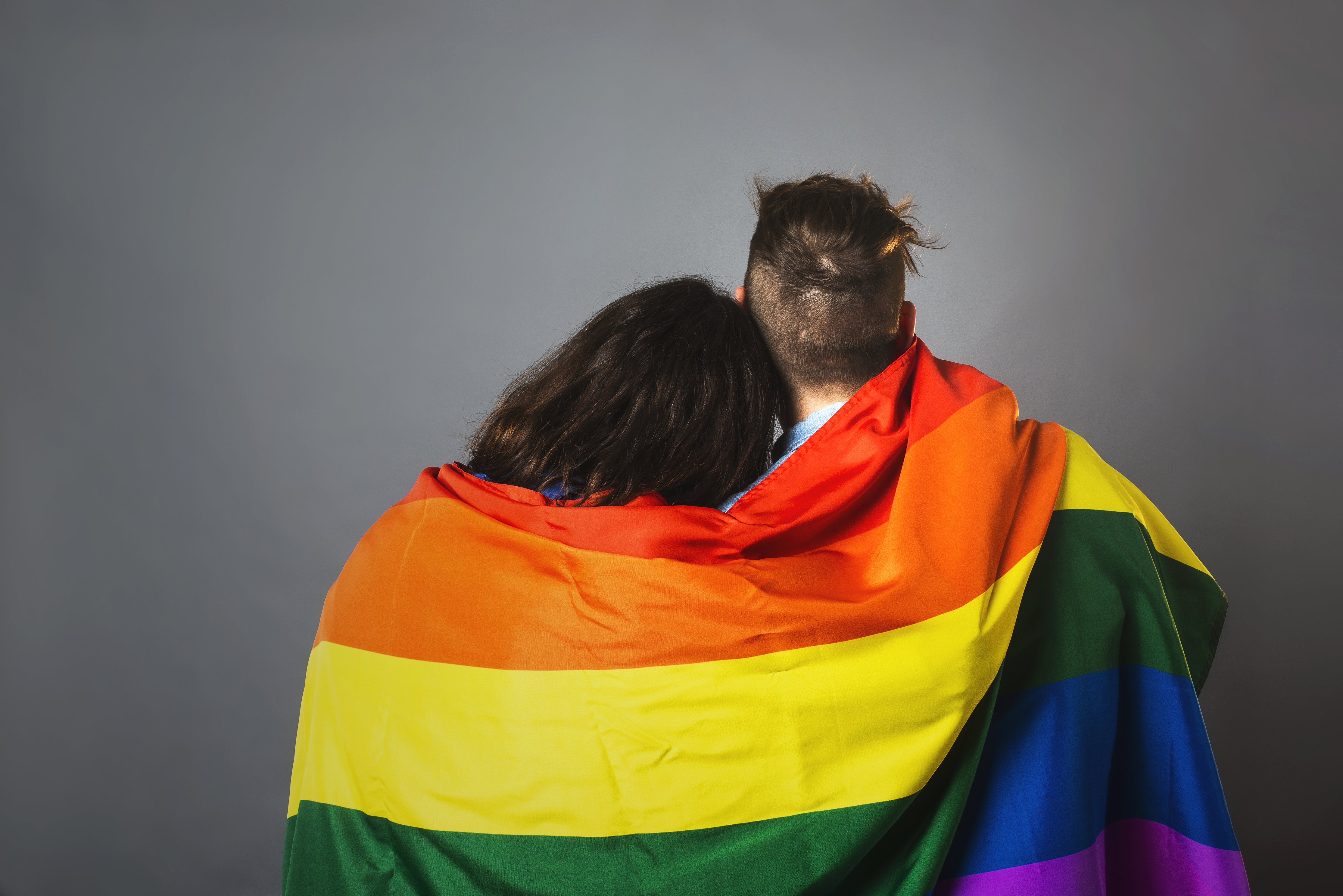 couplewrappedinprideflagjpg by Samantha Hurley from Burst?width=698&height=466&fit=crop&auto=webp&dpr=4