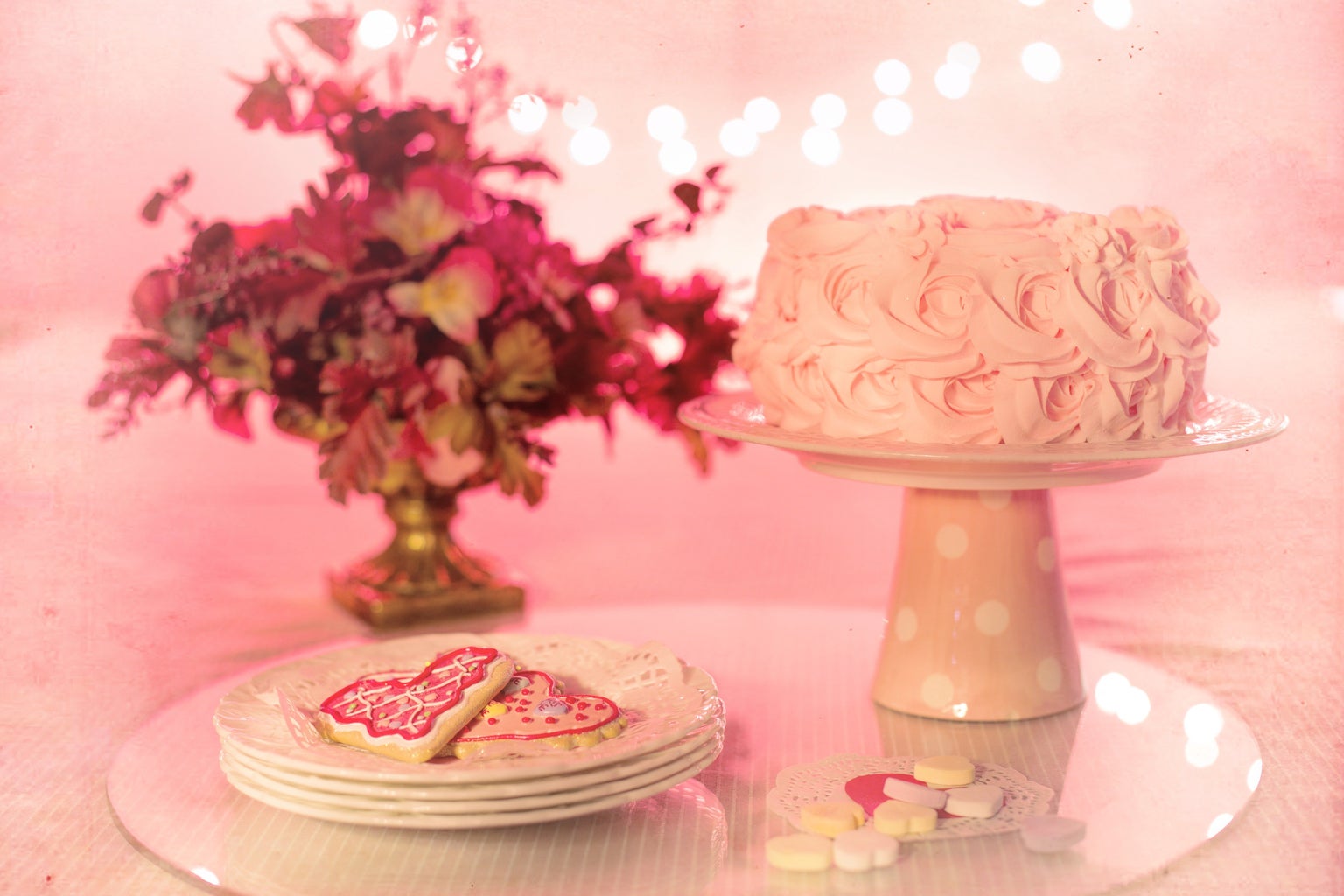 pink icing cake on cake stand valentines